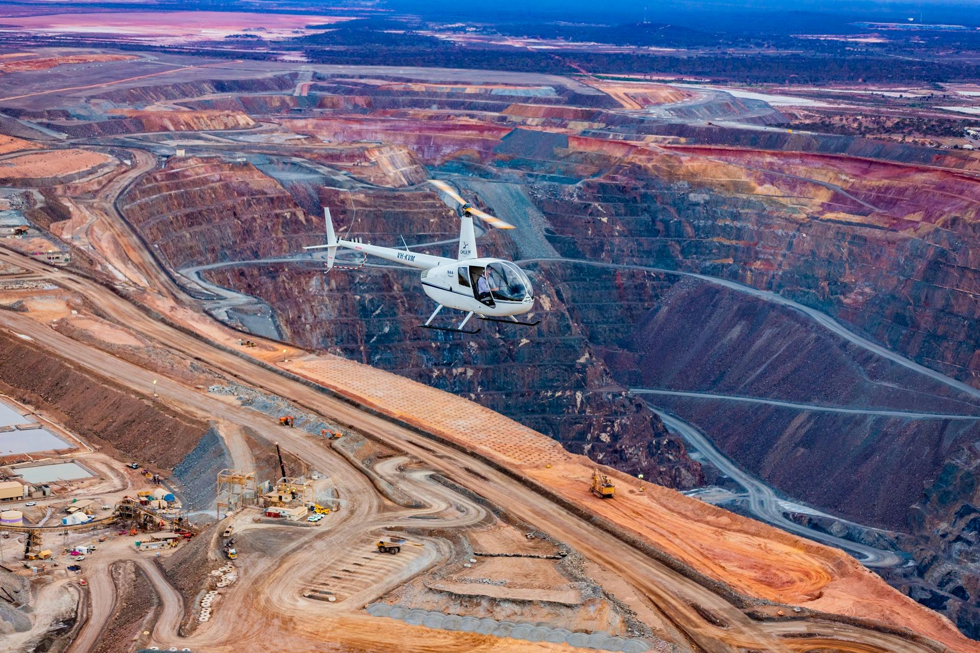 Helicopter flying over Superpit