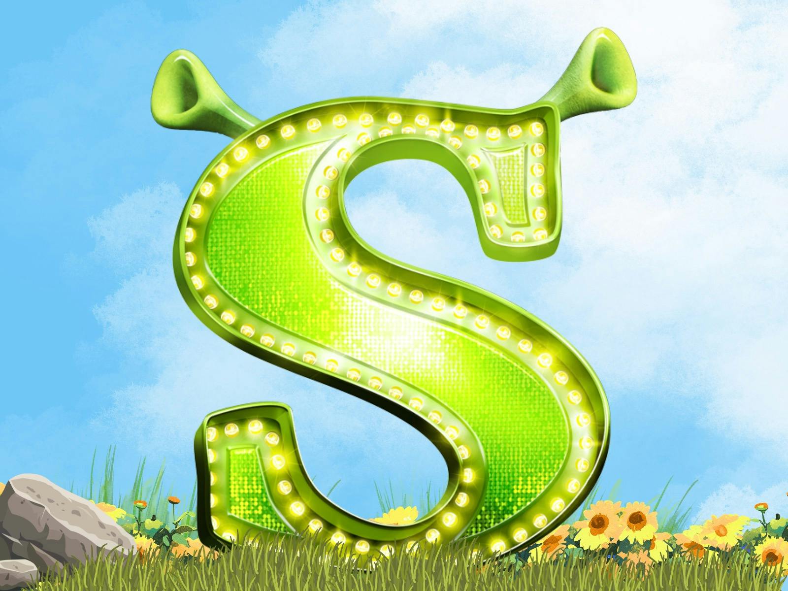 Showstyle S with ogre ears in a sunflower meadow with a bolder.