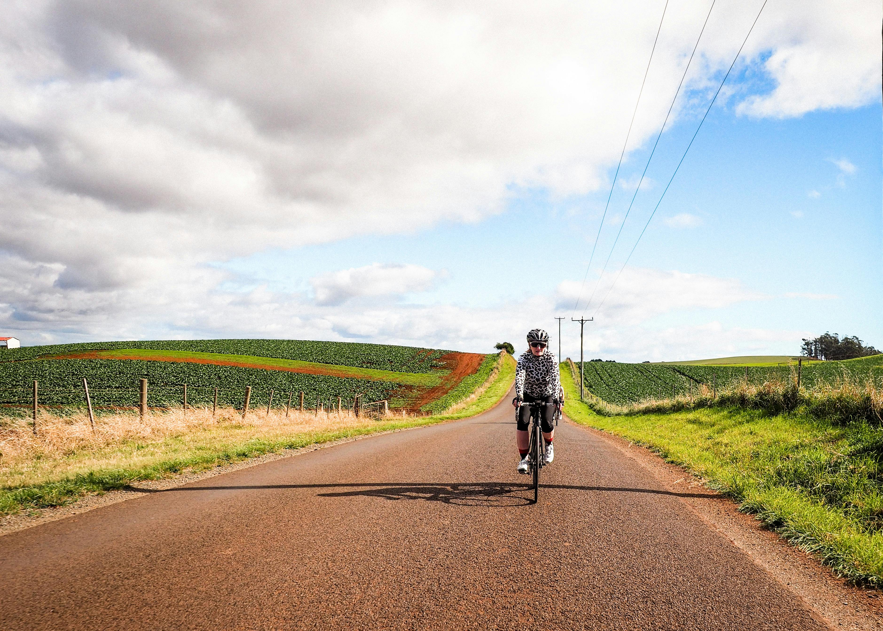 A female cyclist enjoying the country side