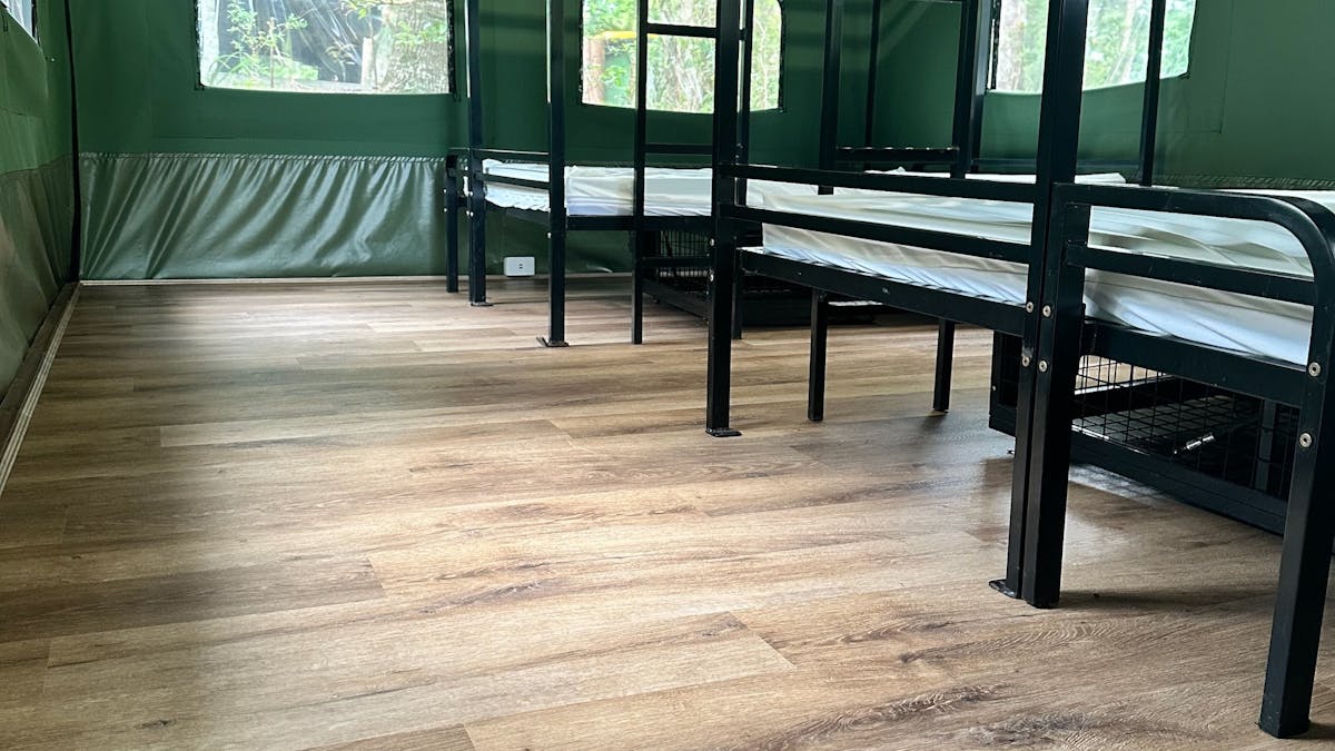 Image shows the interior of the Safari Tents with bunk beds Image shows the interior of the Safari Tents with bunk beds
