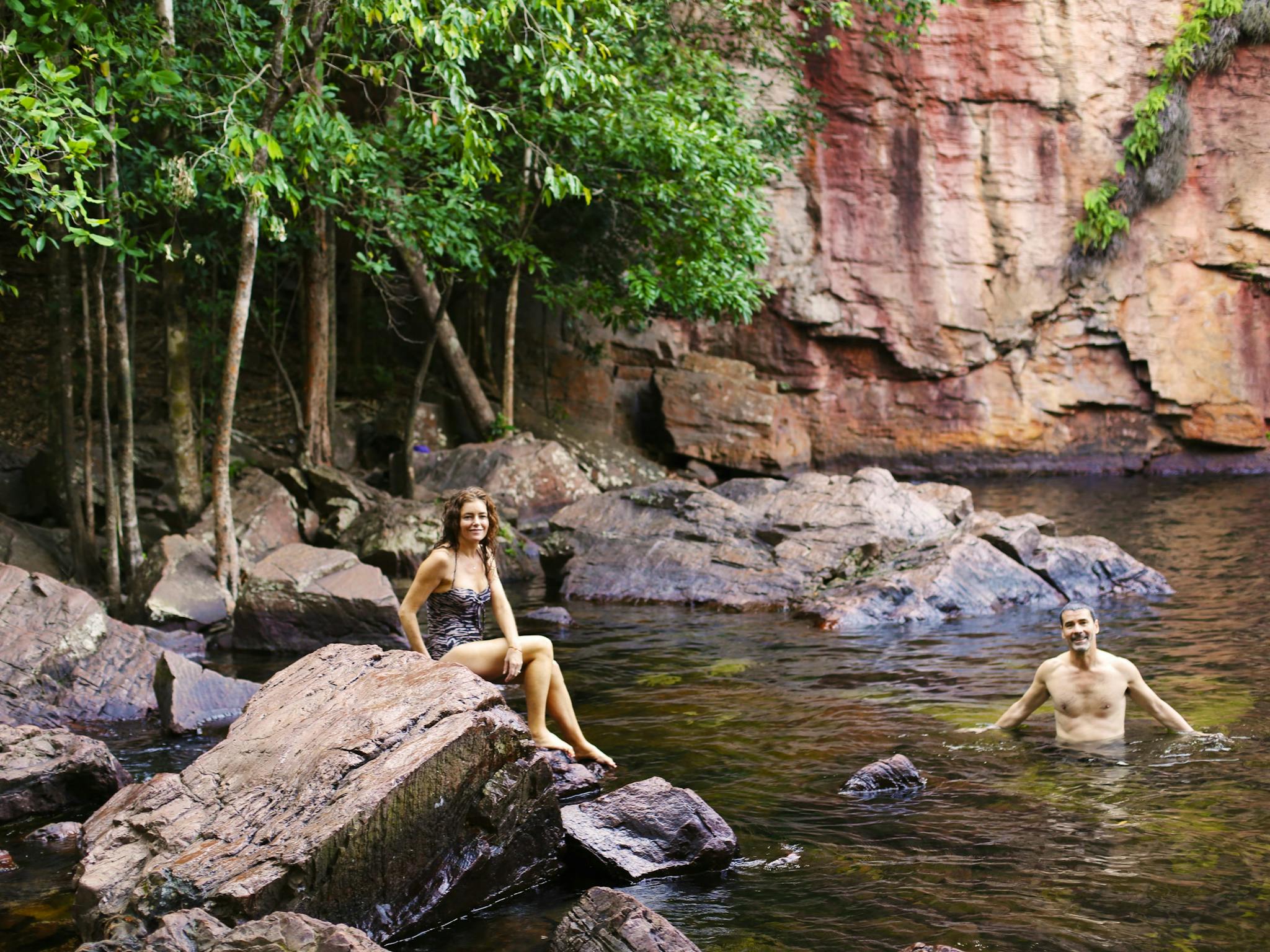 Visitors swimming at Florence Falls, Litchfield National Park.