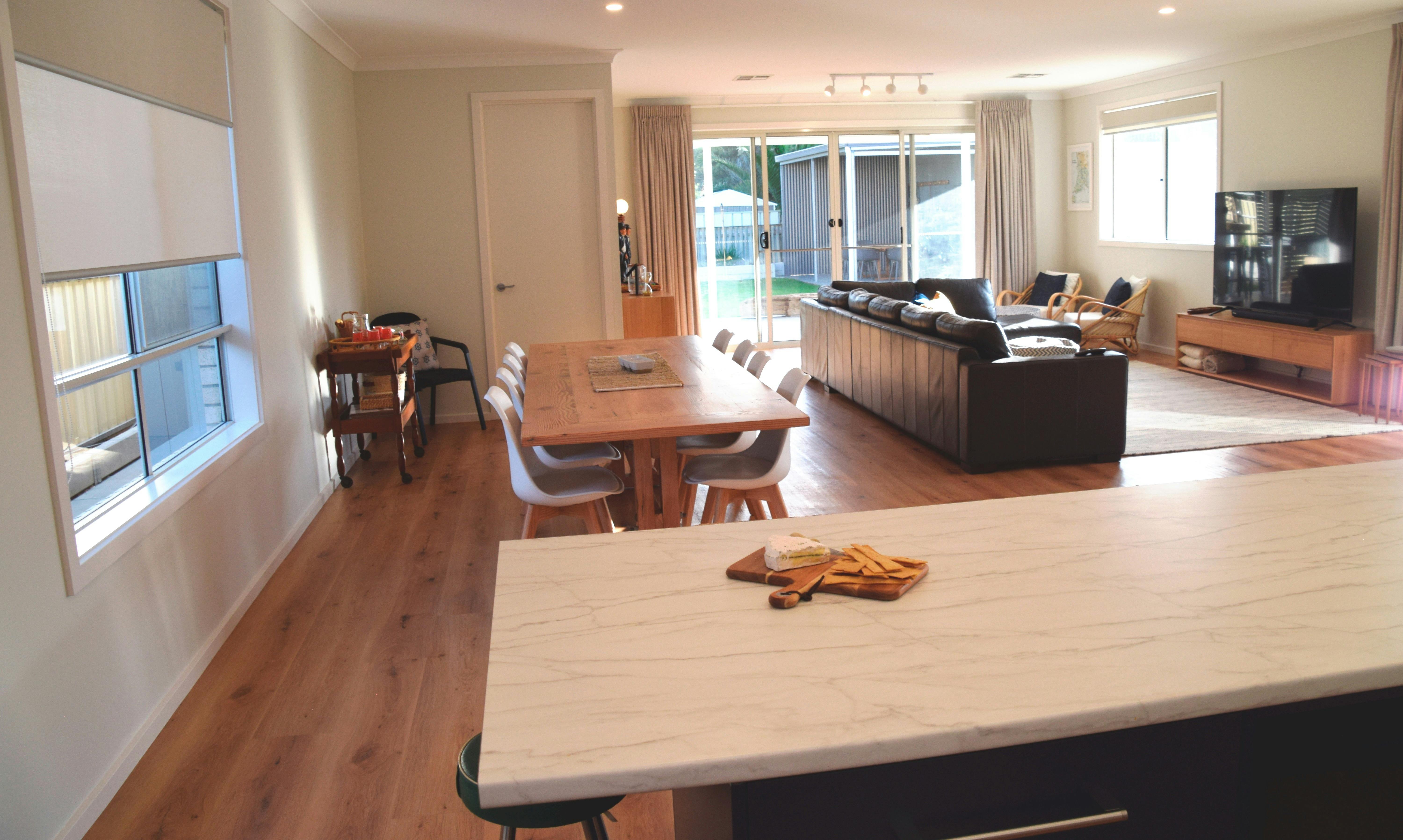 10 people dining table and large open area with access to 2  outside entertaining decks.