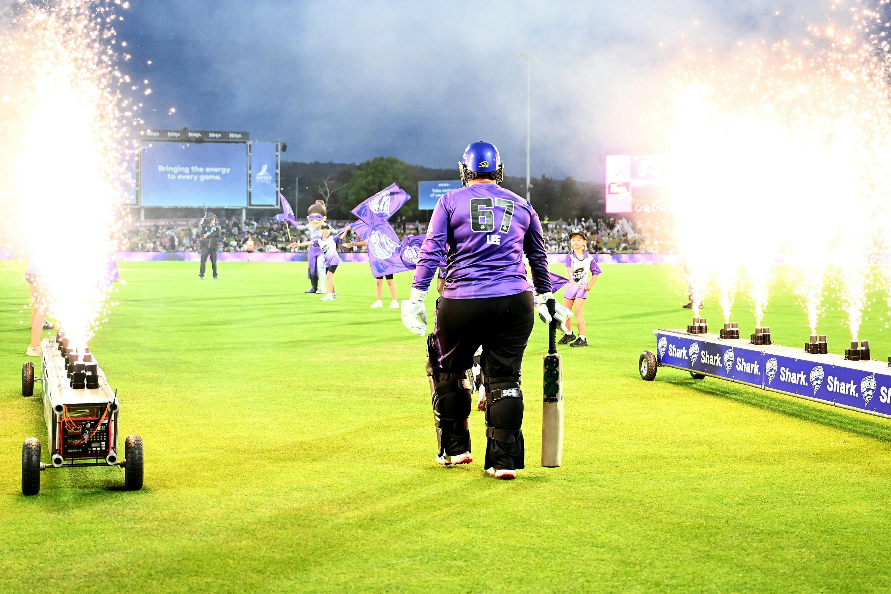 Lizelle Lee walking out to bat for the Hobart Hurricanes