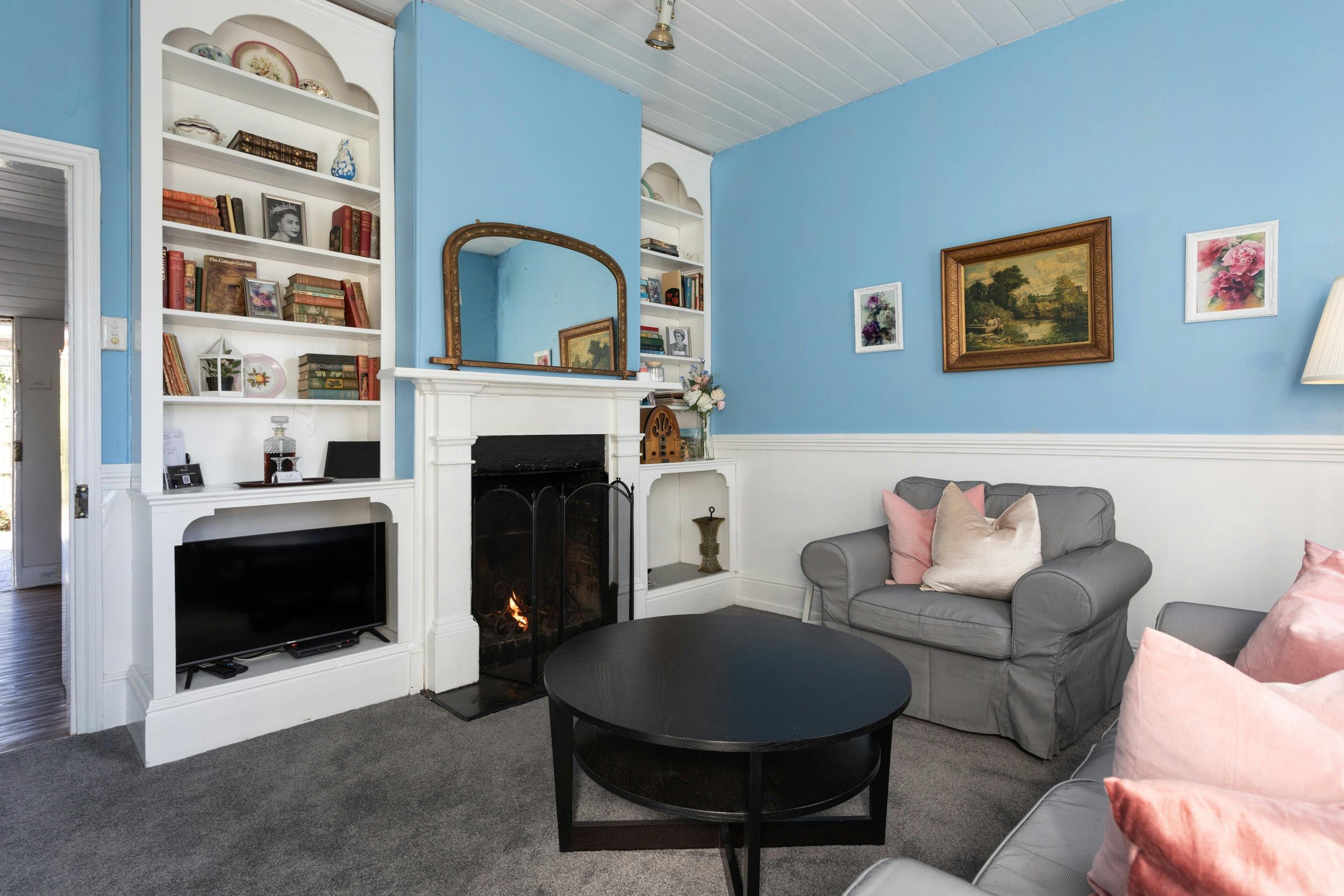 loungroom and open fire English Cottage