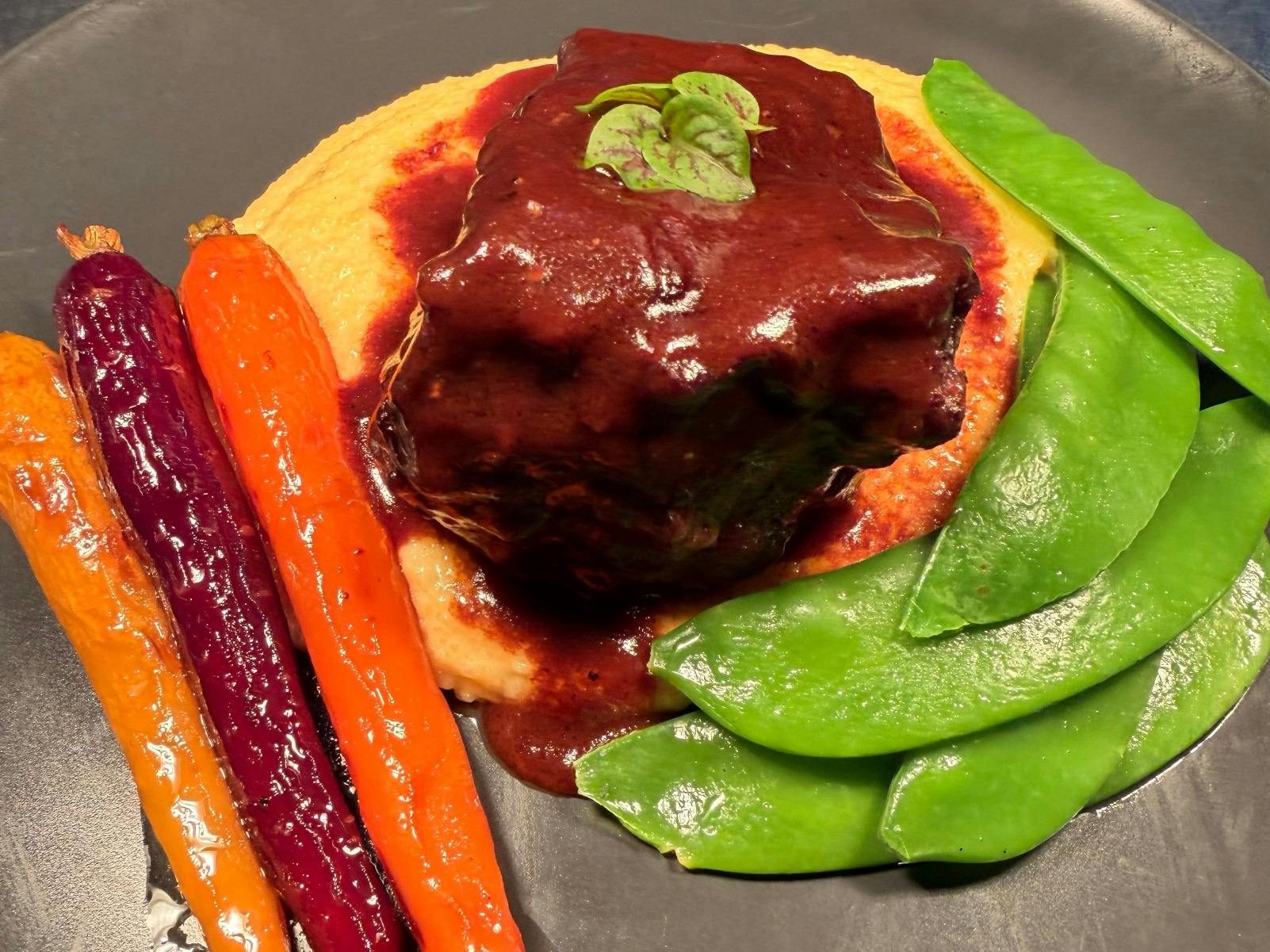 Braised Beef Cheek, Creamy Polenta, Snow Peas and Dutch Carrots