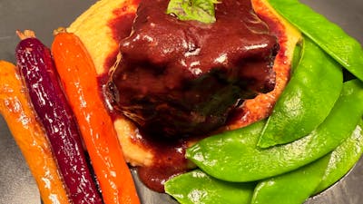 Braised Beef Cheek, Creamy Polenta, Snow Peas and Dutch Carrots