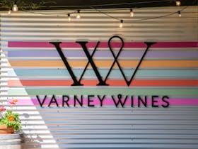 Colour wall with Varney Wines logo sign