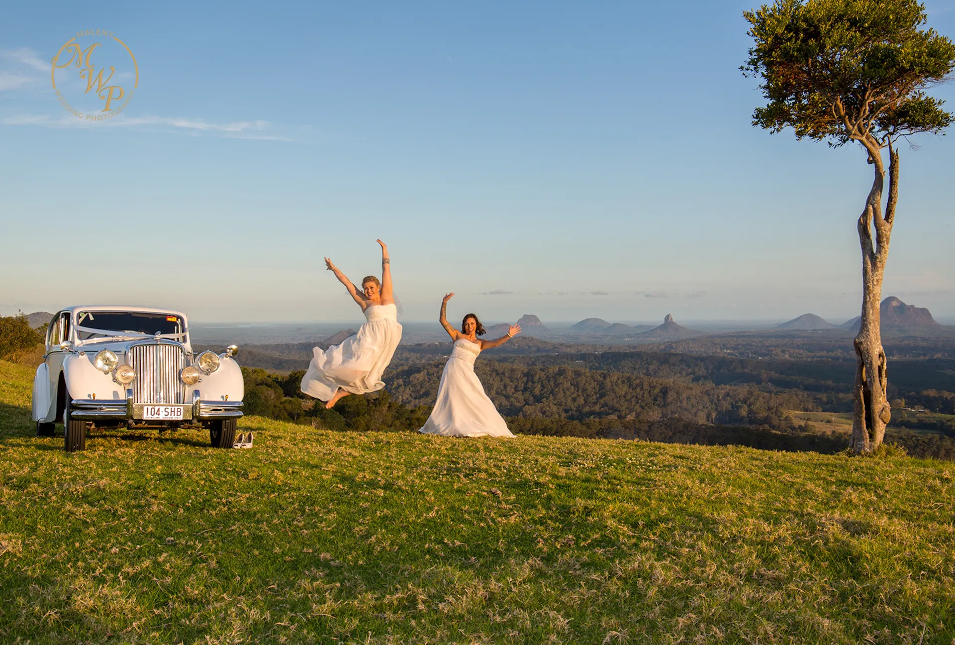 Same sex wedding couple One Tree Hill Maleny by Malenyweddingphotography