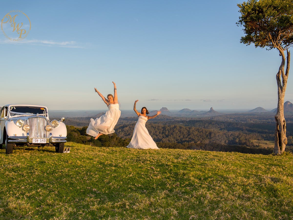 Same sex wedding couple One Tree Hill Maleny by Malenyweddingphotography