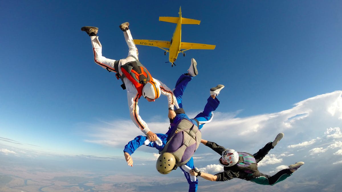 Skydive Ramblers AFF student with instructors Belgy and Tracy - Photo by Wade