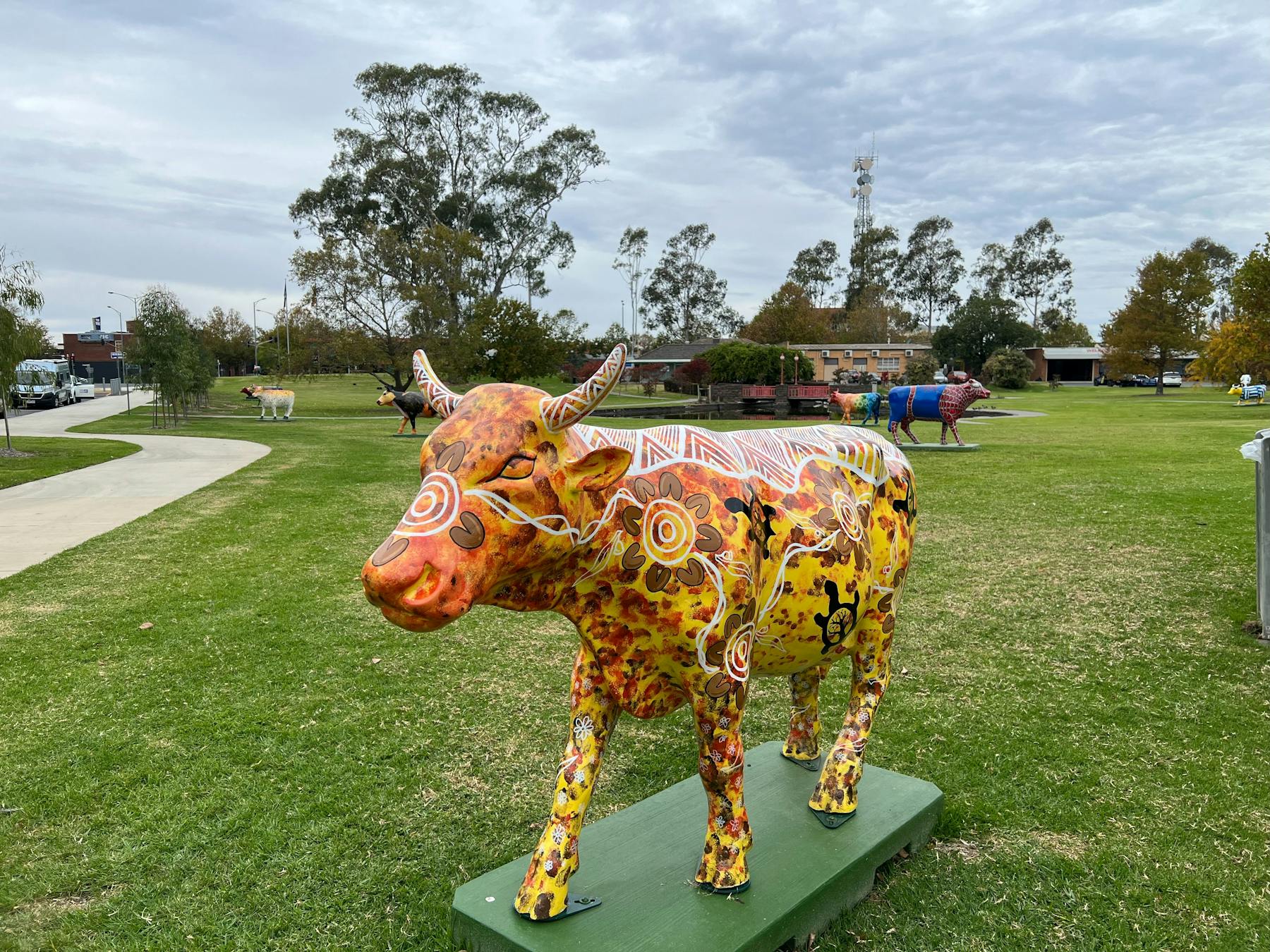 Sista Cow in Monash Park with Spider Cow, Rainbow Bubbles, Flaming Cow and Shepparton Tower
