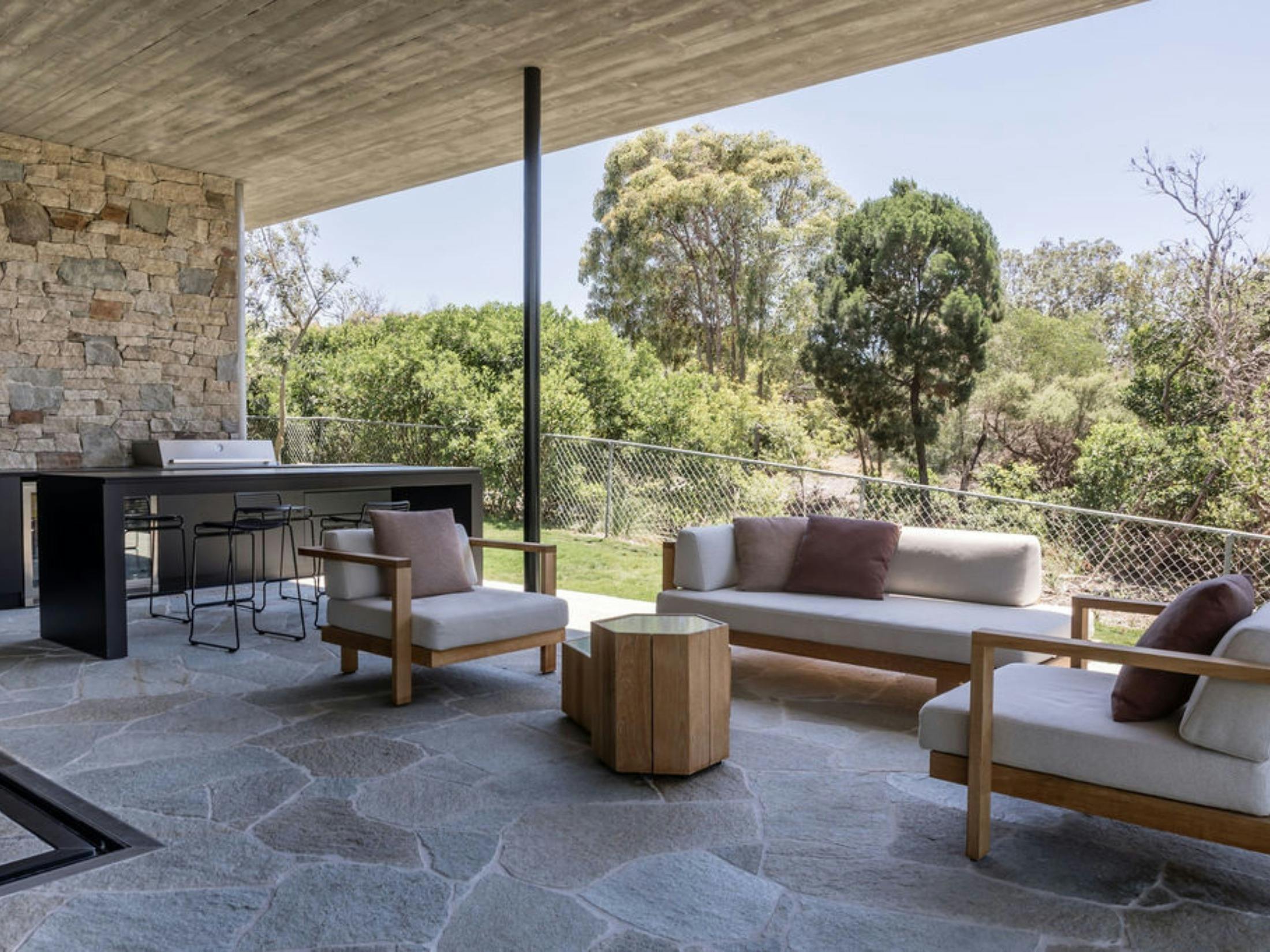 Architectural design beach house surrounded with integrated landscaping