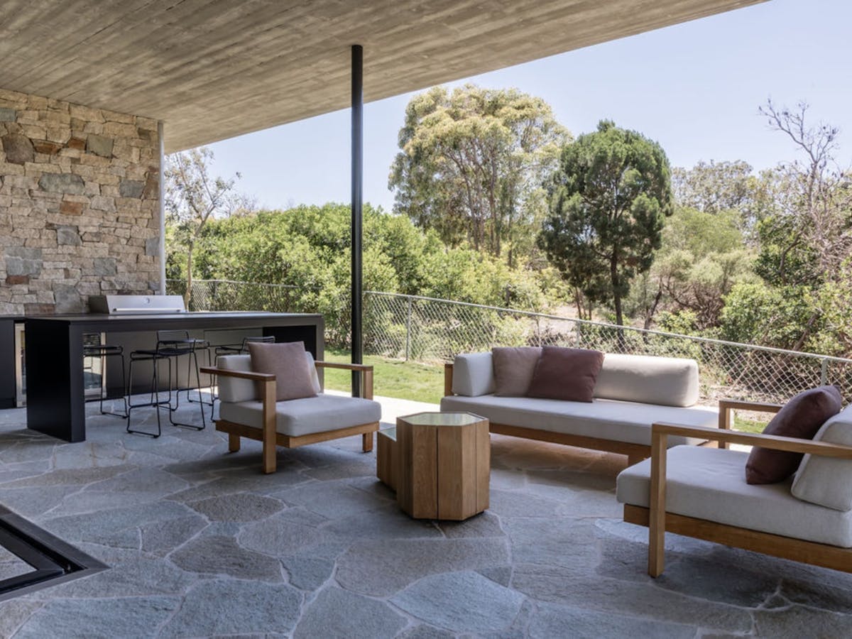 Architectural design beach house surrounded with integrated landscaping