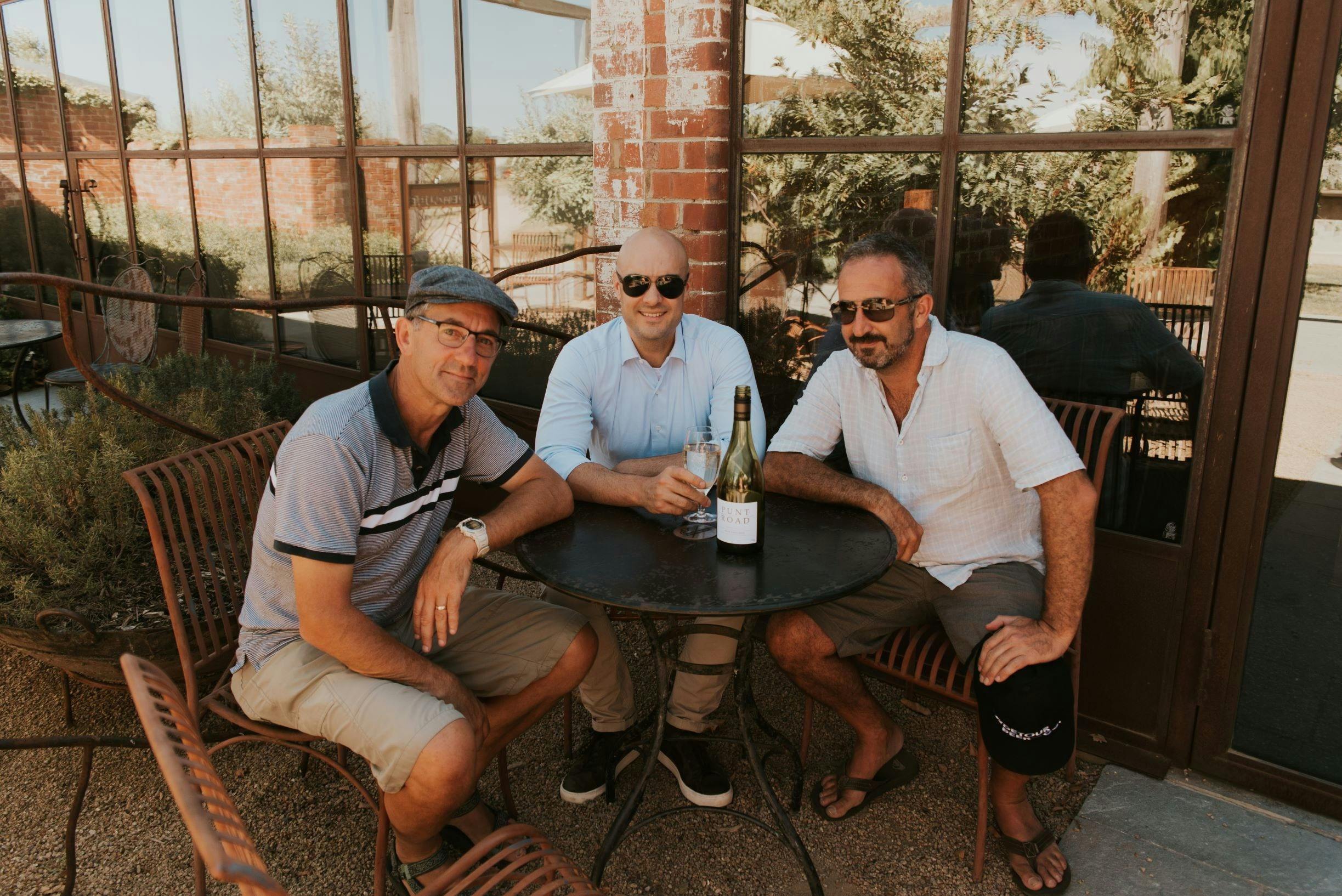 Yarra Valley winery tour the boys enjoying a glass of wine at Punt Road winery