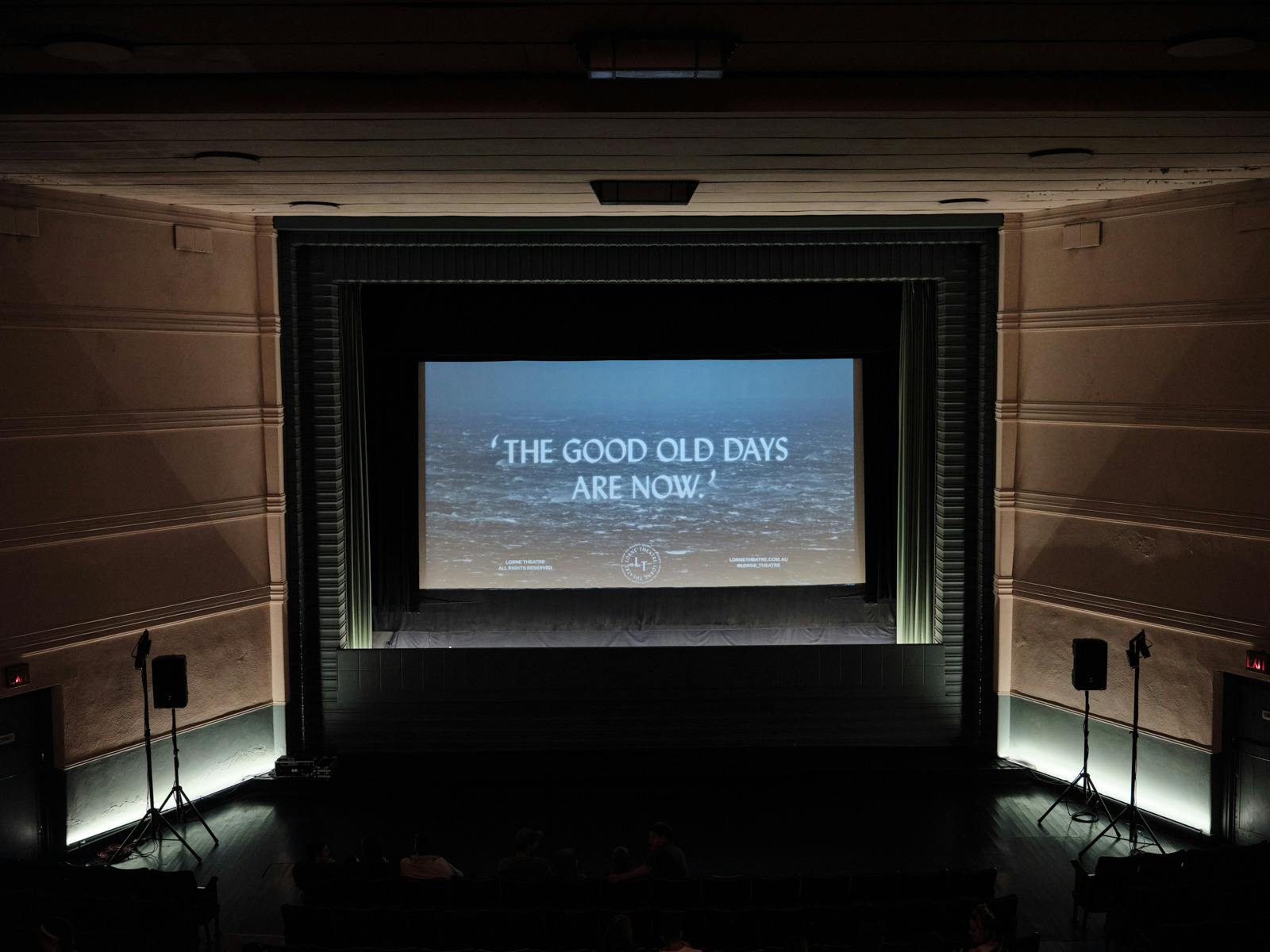 Interior of Lorne Theatre - Screen with text saying "The good old days are now"