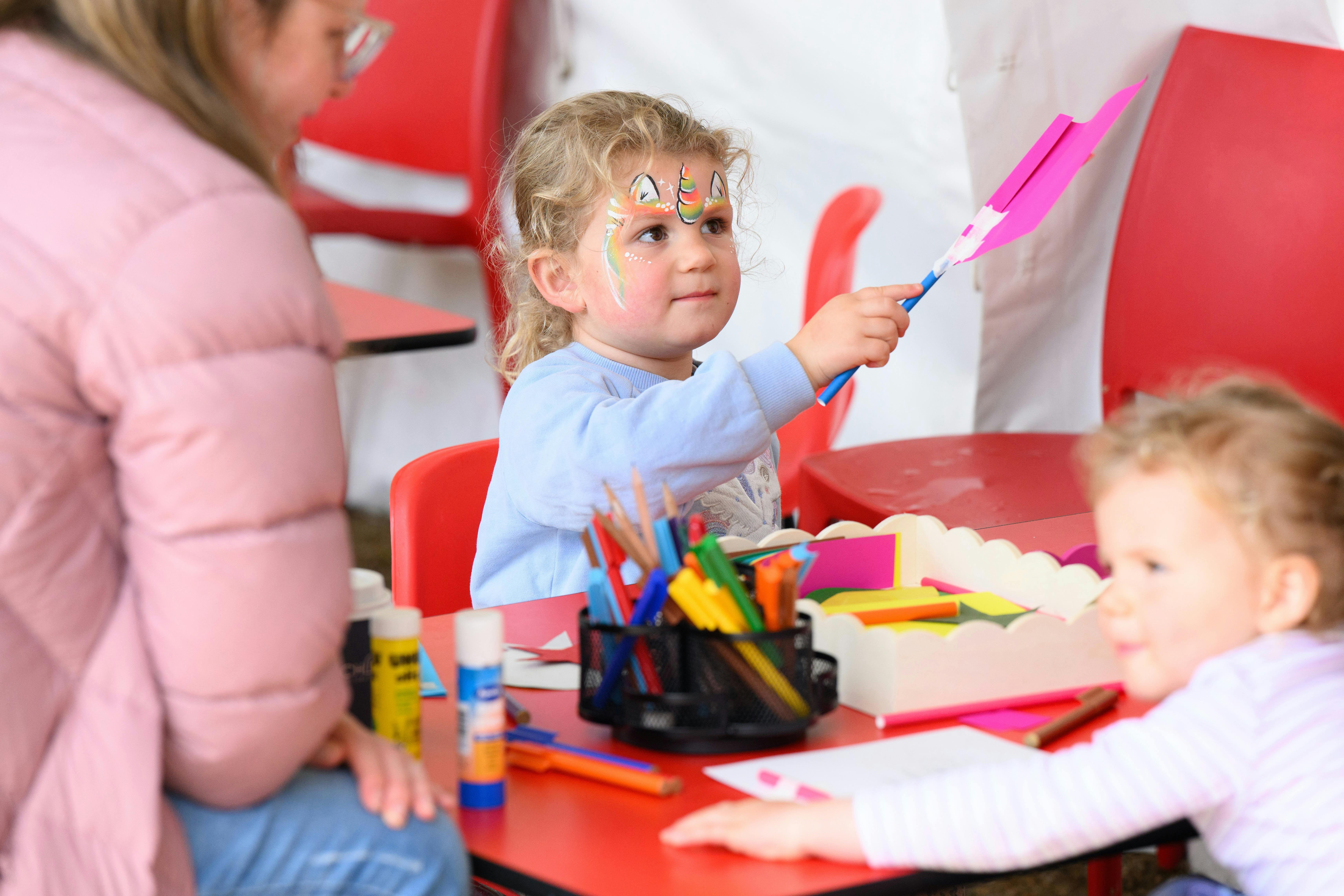 Children enjoying craft activities at Eureka Sunday event