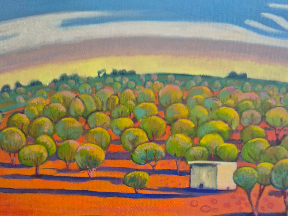 Landscape with red dirt, trees, a little hut and a blue and yellow sky