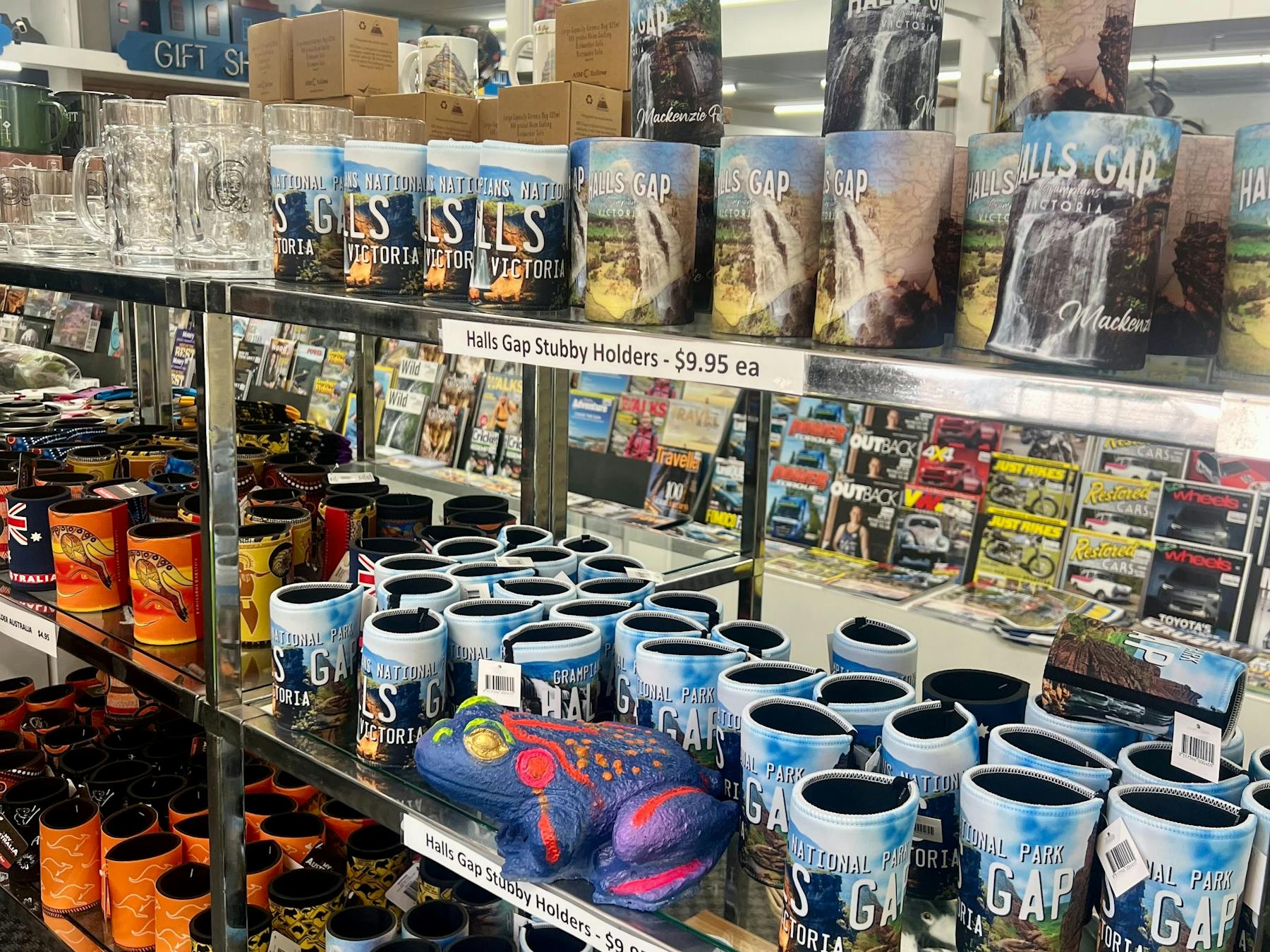 Brightly painted plaster frog on a shelf