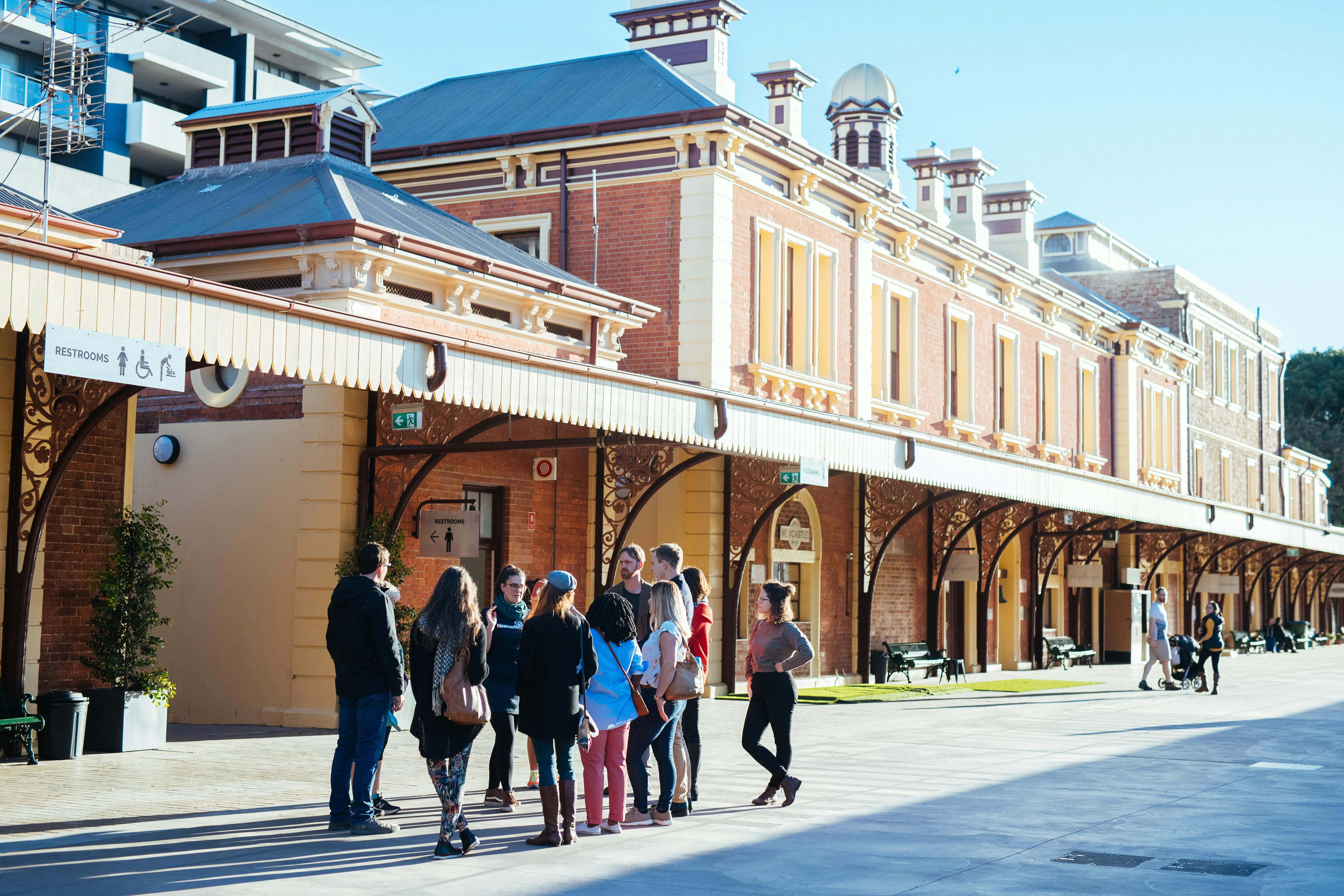 A tour group learning about the redevelopment of The Station in Newcastle