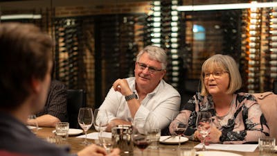 Wine Hopper guests enjoying a wine.