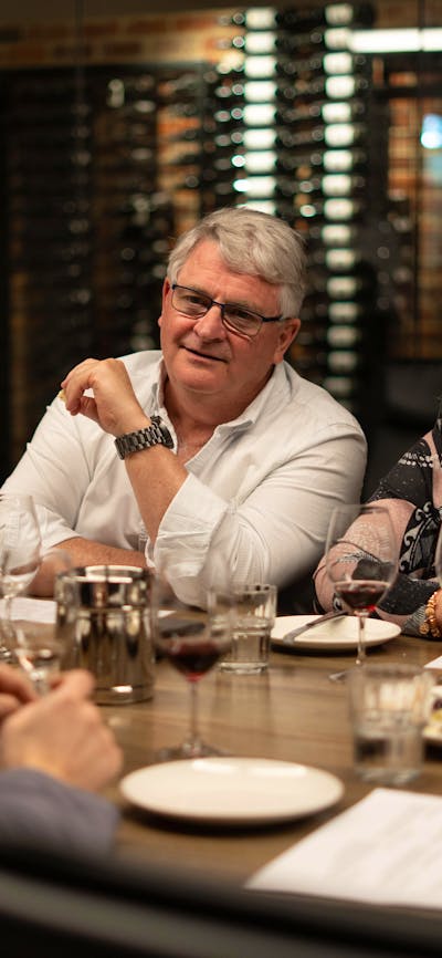 Wine Hopper guests enjoying a wine.