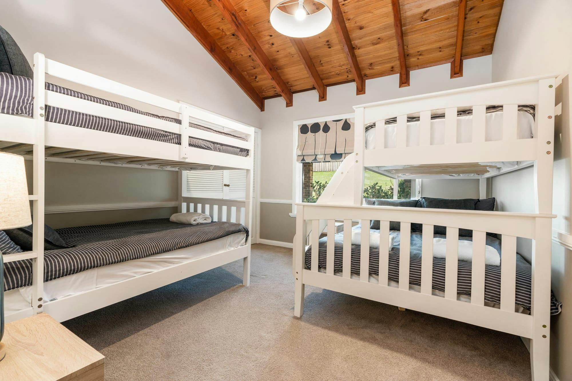 Bedroom with 3 singles and 1 double bunk bed, perfect for kids