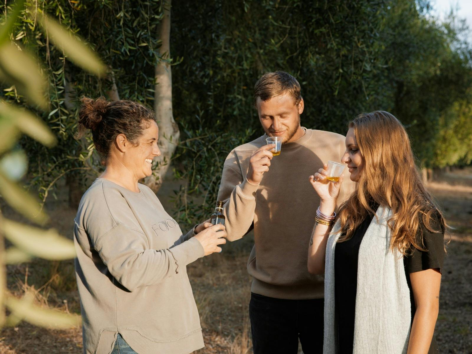 Visitors enjoying an olive oil tasting in the Peninsula Providore olive grove