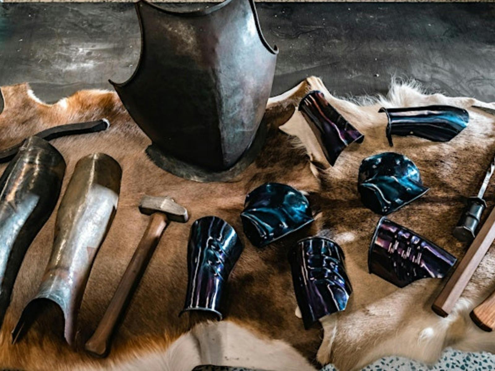 Armoury on display on animal skin on table