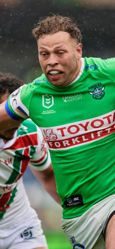 Canberra Raiders player Sebastian Kris running the ball.