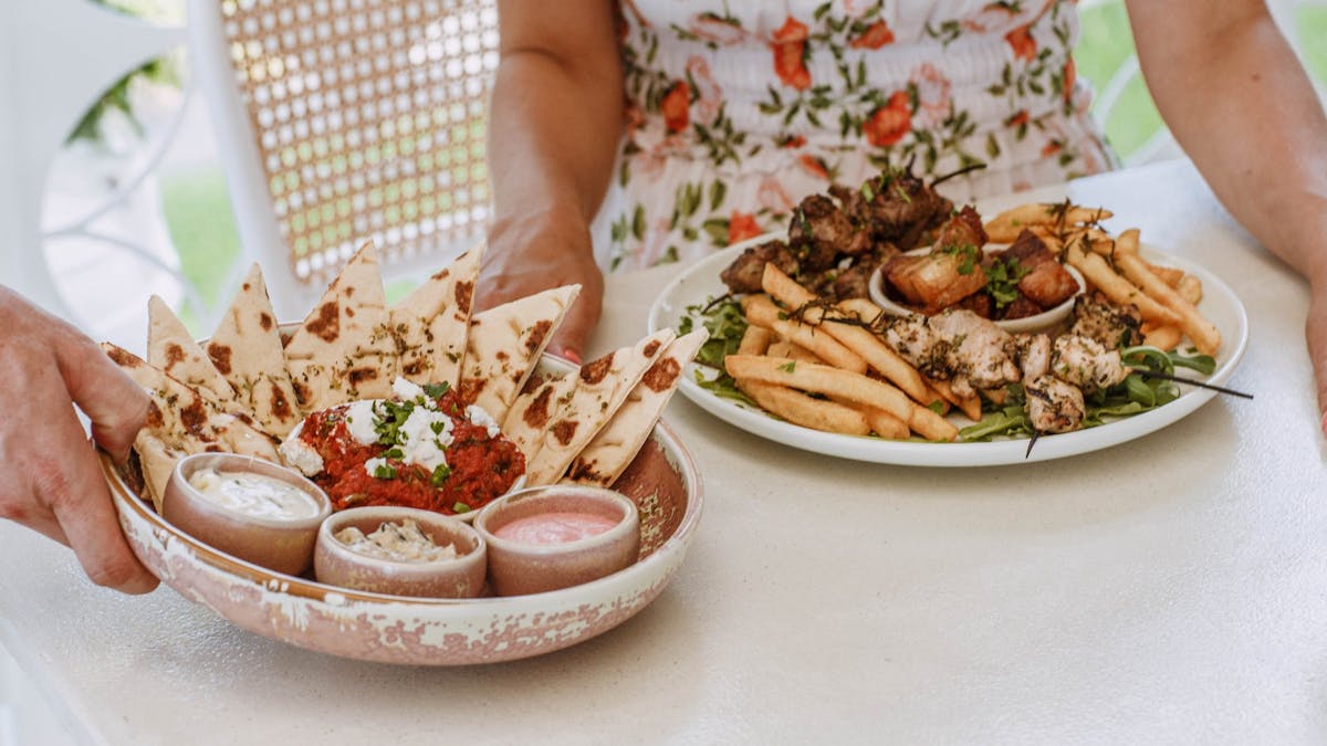 Greek share plates pita dip plate and lamb and pita plate