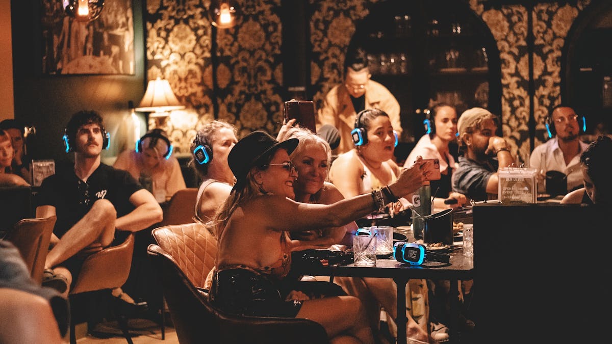 Audience capturing moments of live music