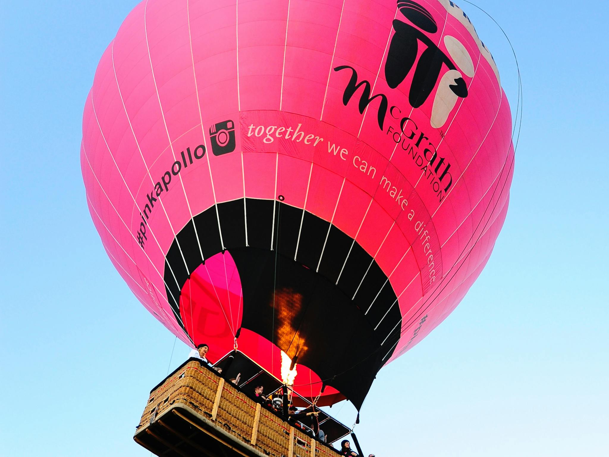 Giant Pink Hot Air Balloon rising up into the Air Giant Pink Hot Air Balloon rising up into the Air