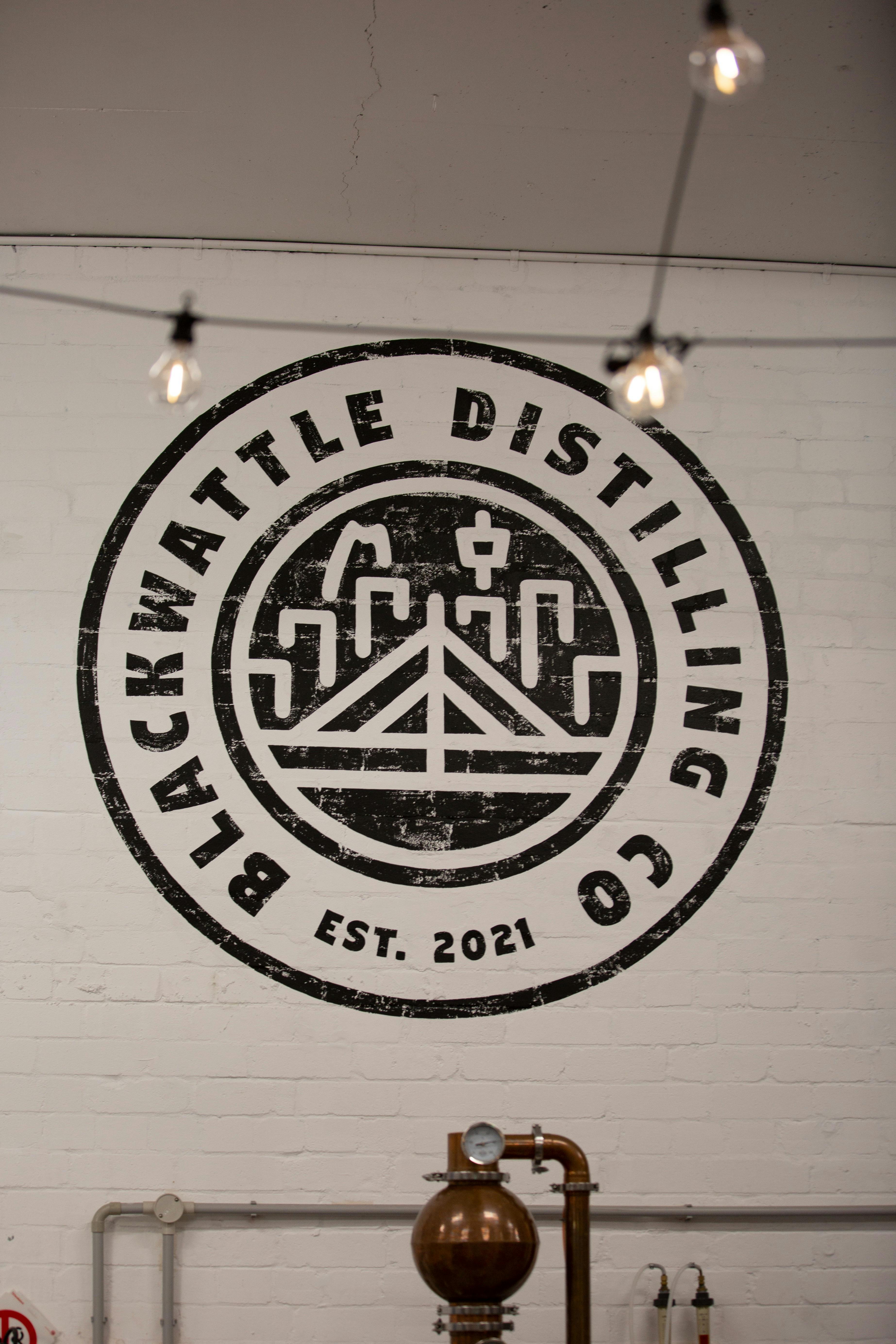 Our logo on the wall of the distillery.