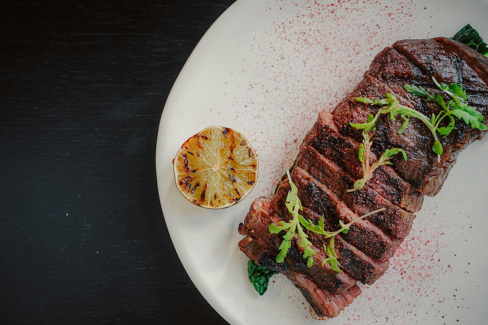 Ranger's Valley black onyx flank steak, Davidson plum teriyaki, charred lime
