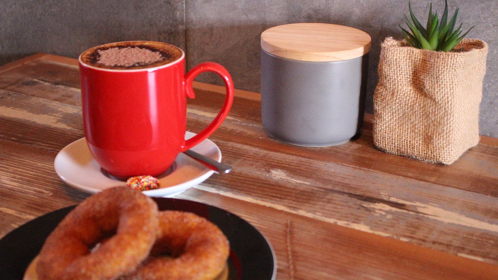 Hot fresh donuts with a cappuccino  - the perfect mix!