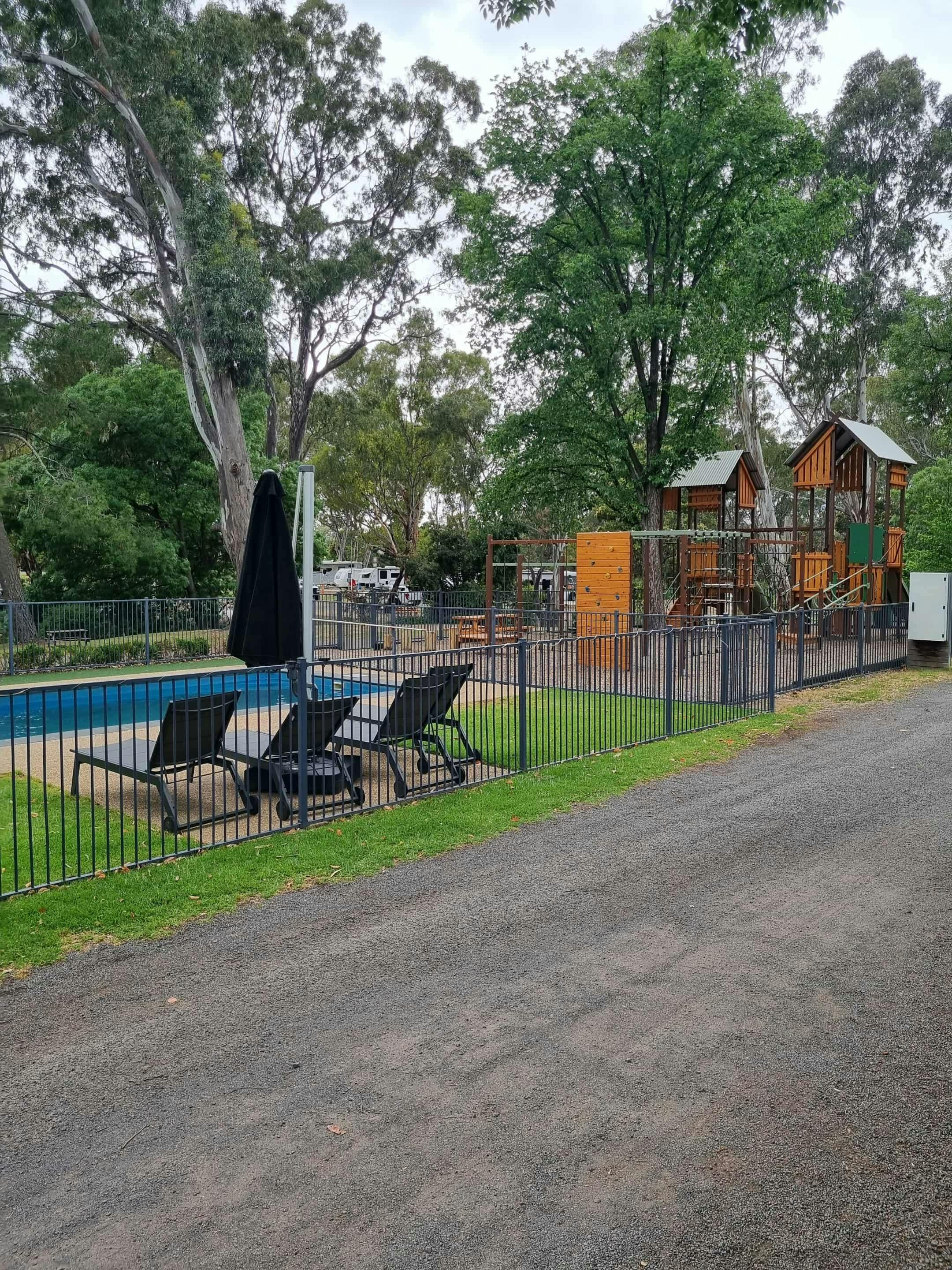 View of swimming pool and children play area