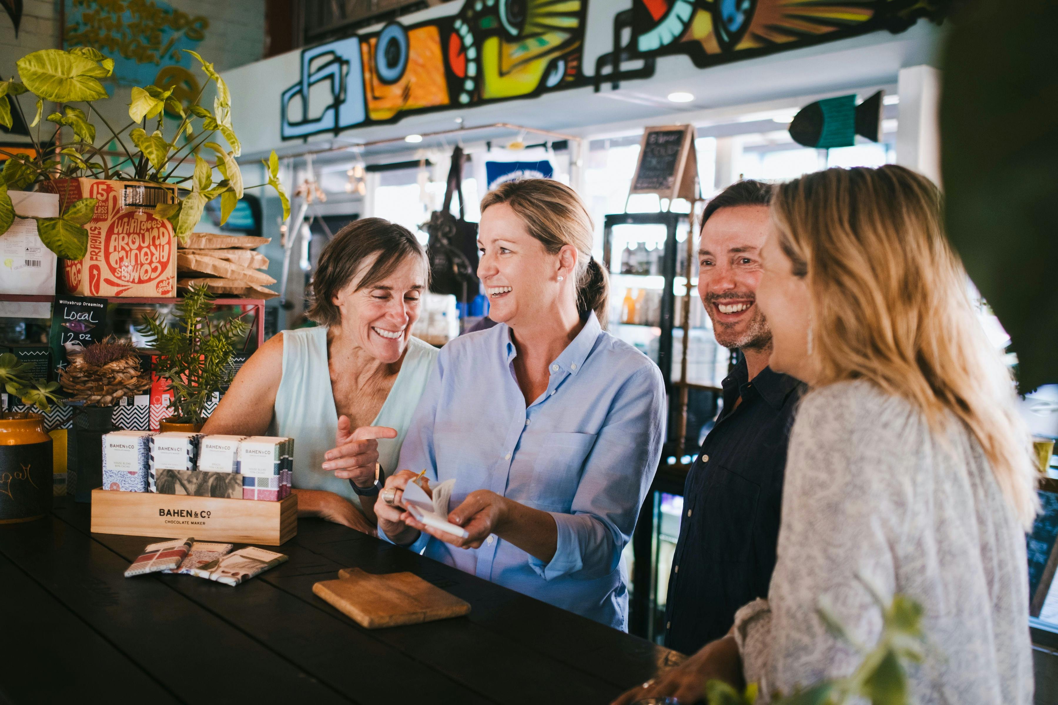 Tour host with guests at a chocolate tasting stop