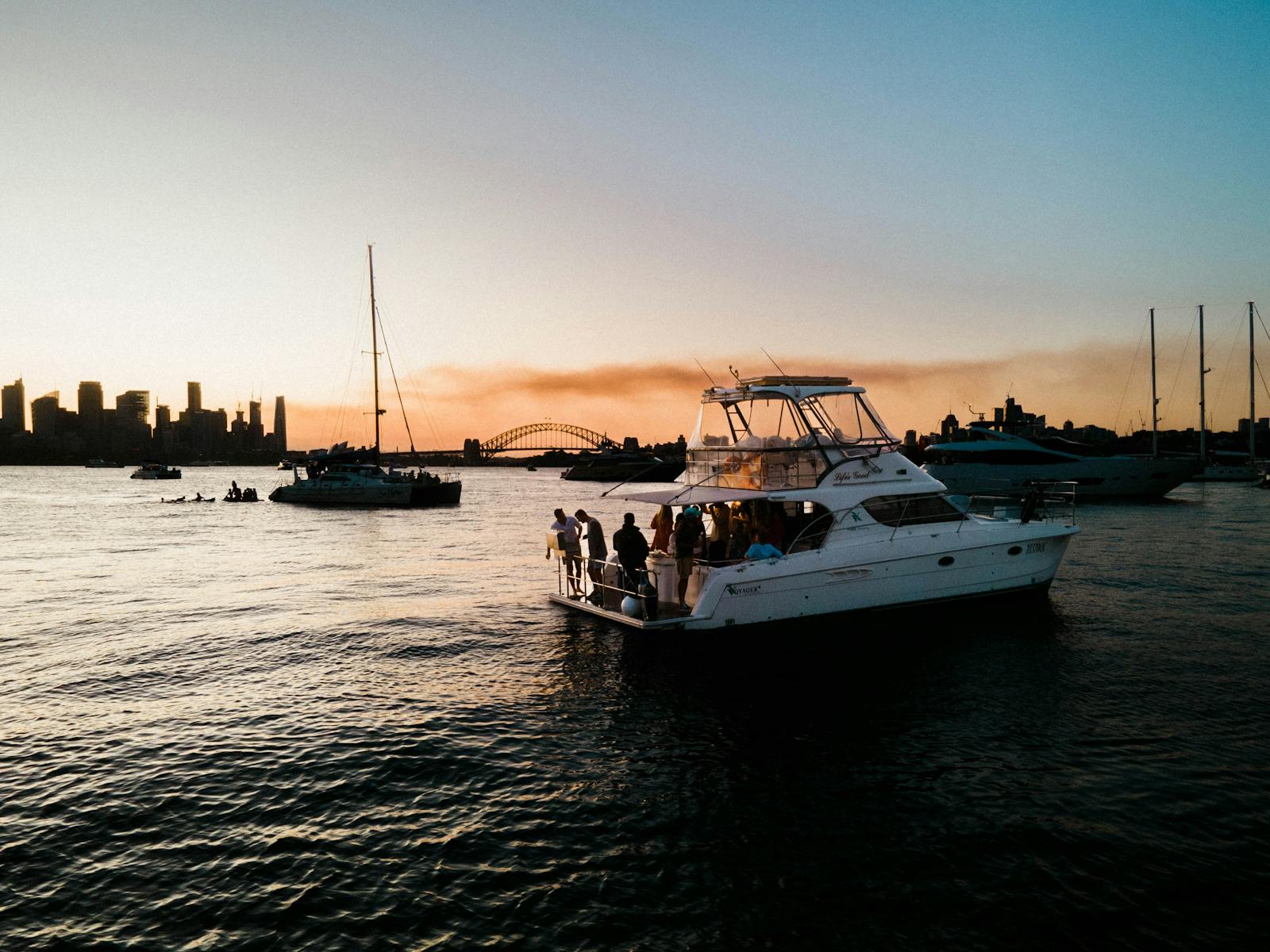 Sydney Harbour charter swimming and enjoying the Sydney Harbour Bridge