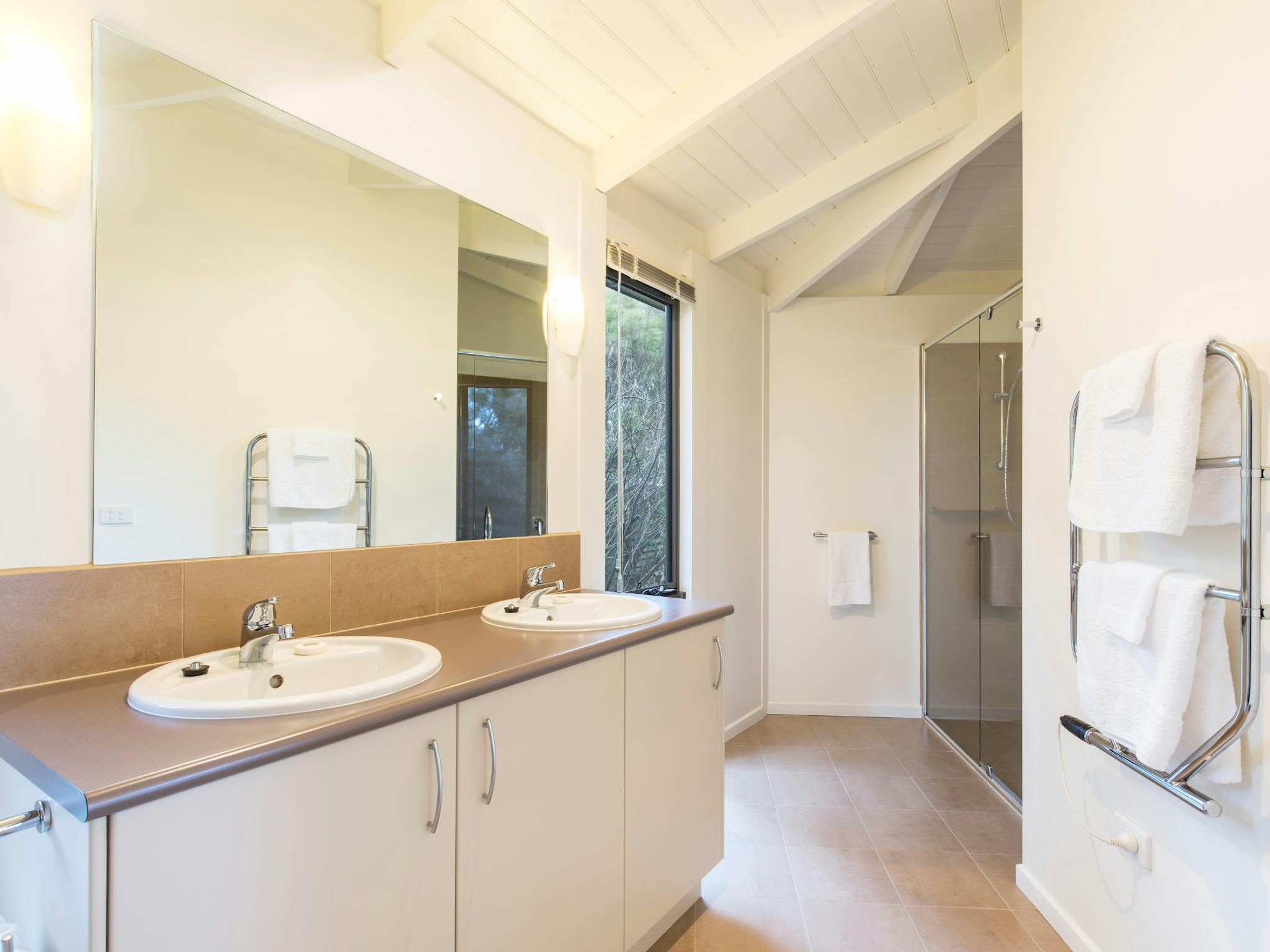 Bathroom basins, shower and towels