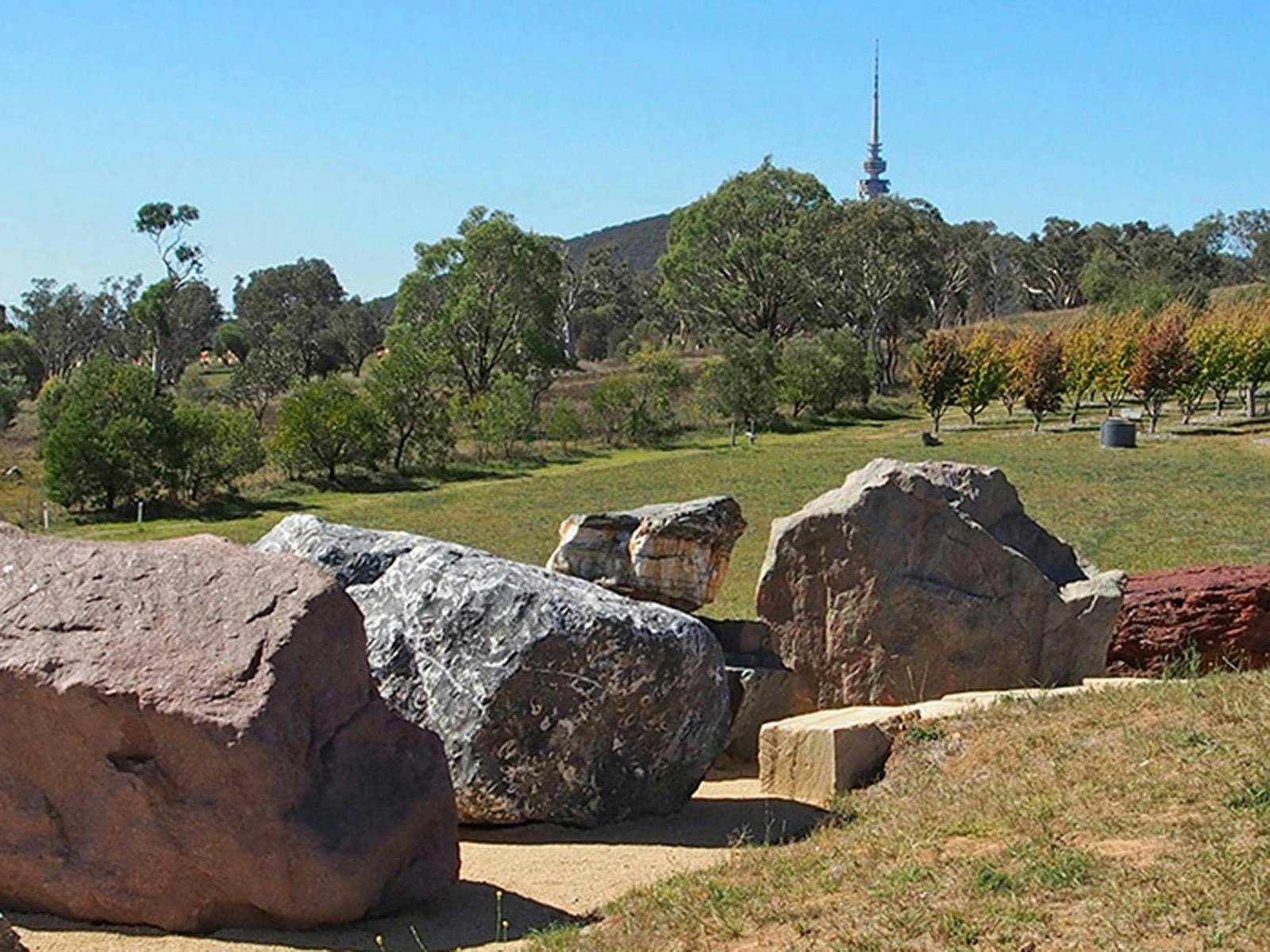 A panoramic image displays the variety of large rocks in the National Rock Garden