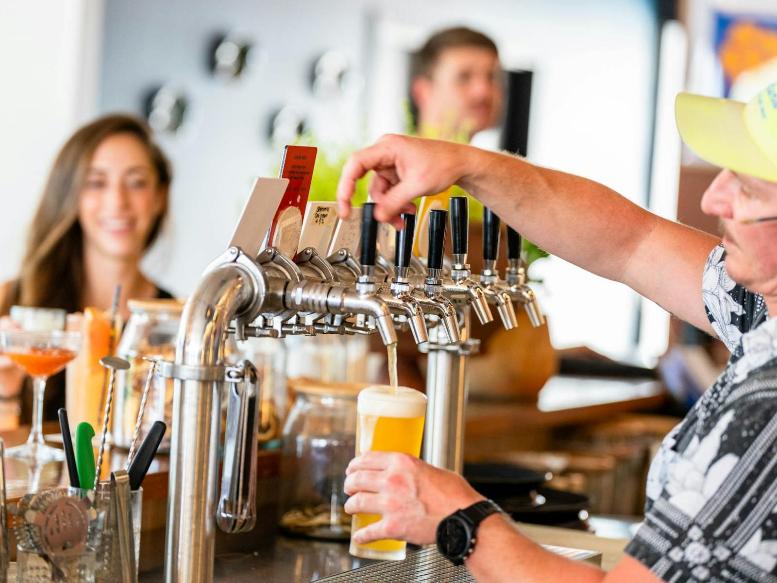 pouring beer from the tap