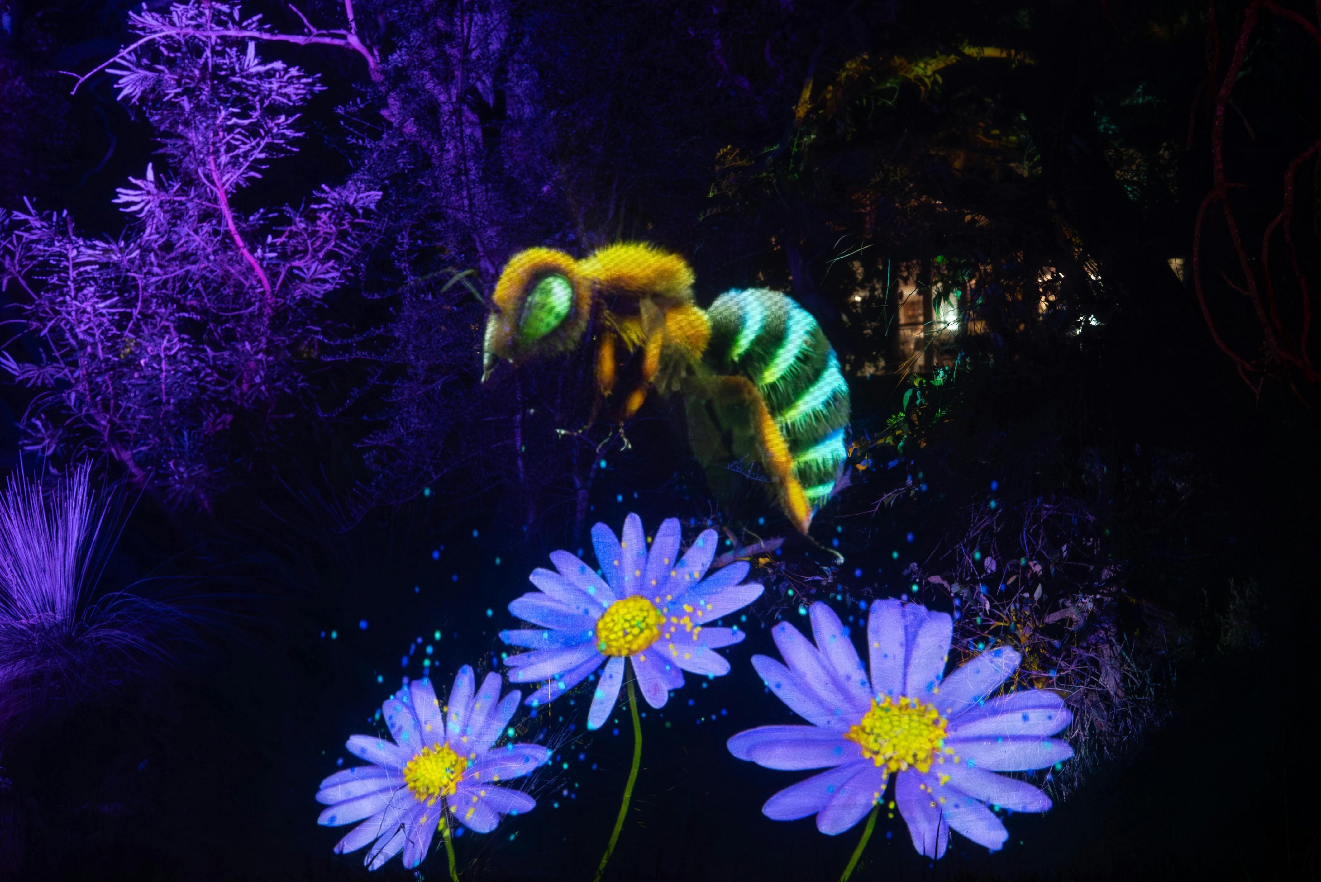 A hologram of a bee pollinating flowers