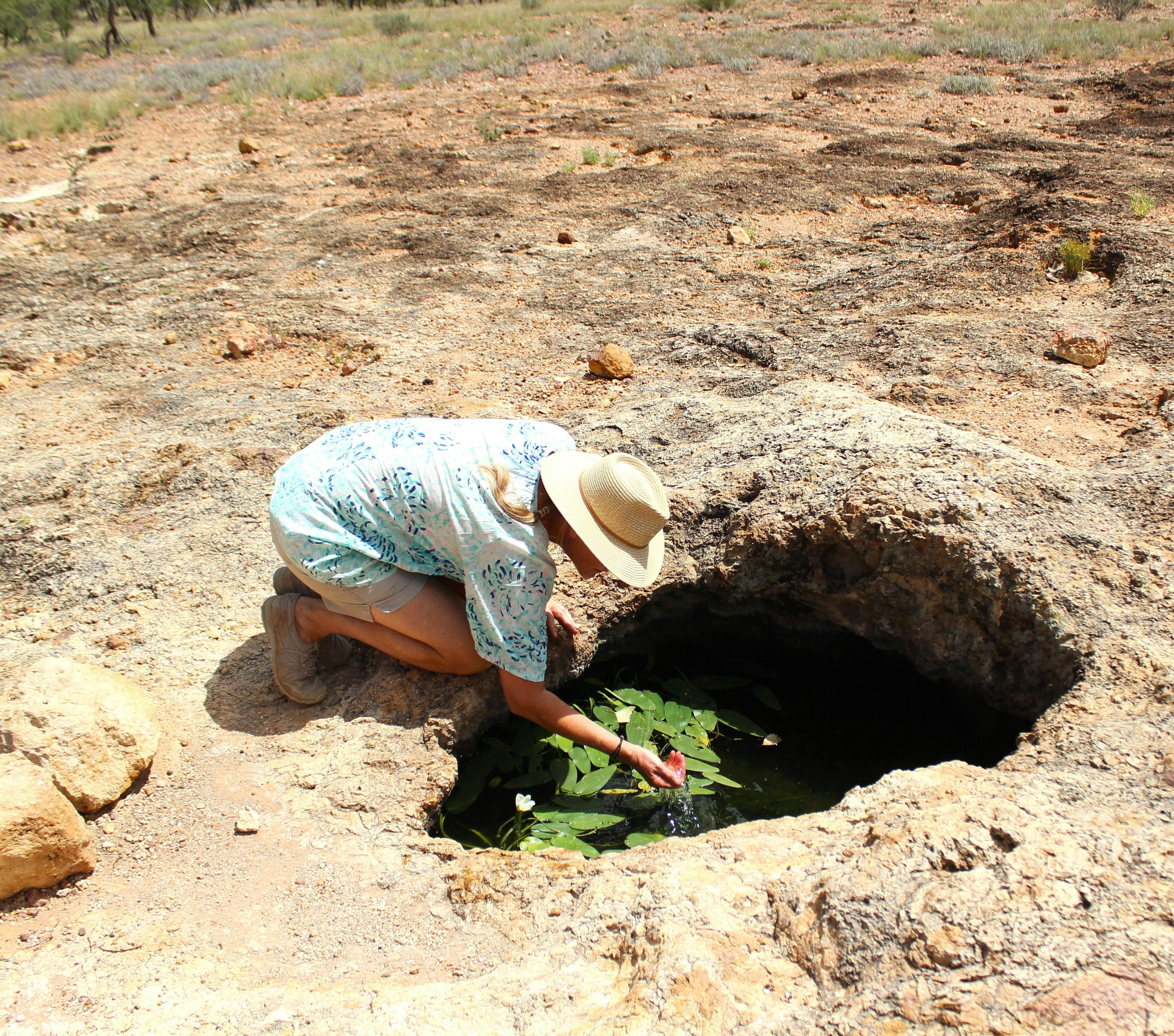Drinking from a natural water well