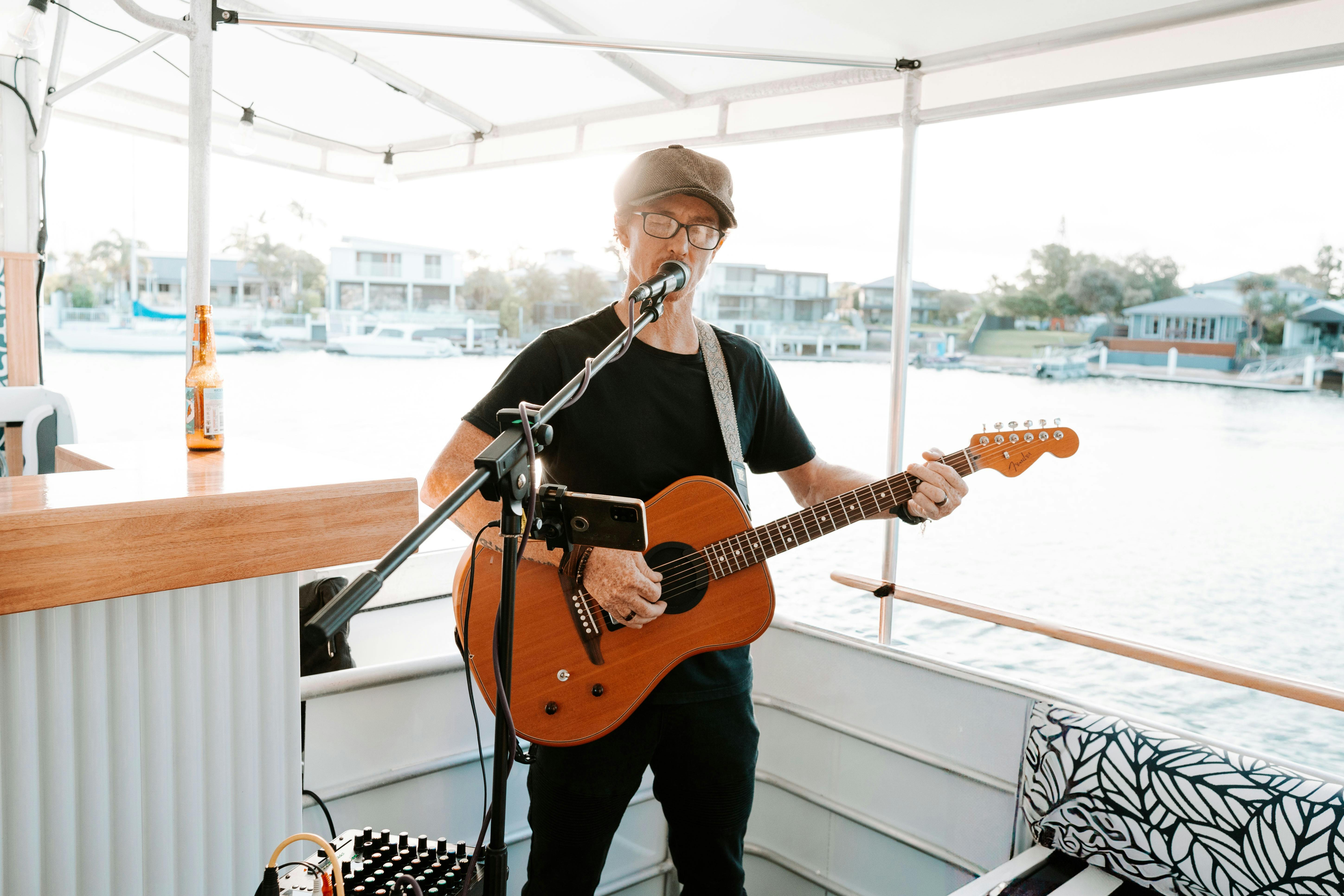Live Musician Playing Guitar aboard The Boat Mooloolaba