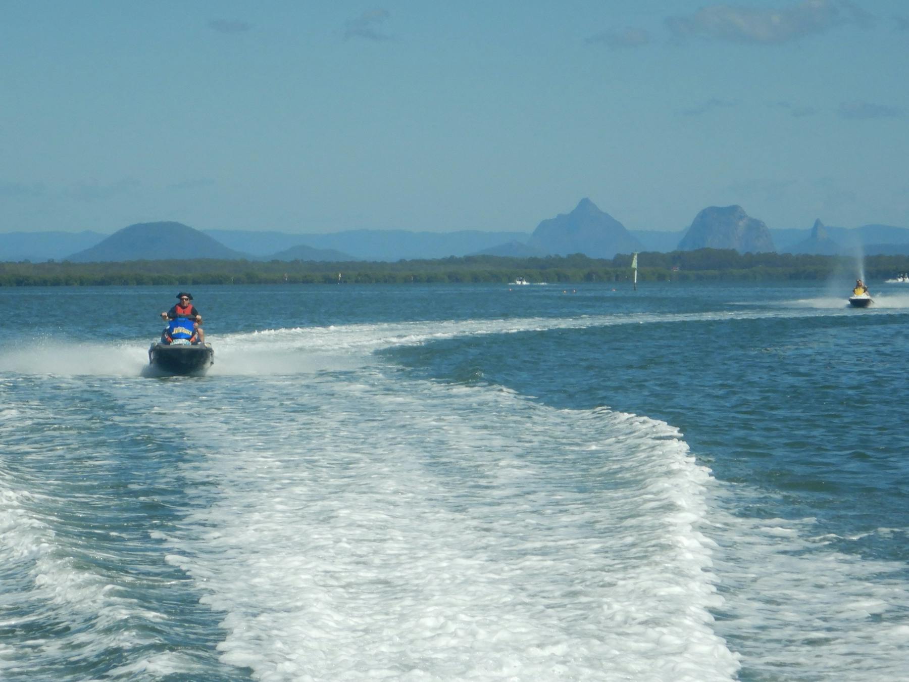 Dominating Pumicestone Passage are the volcanic Glasshouse Mountains