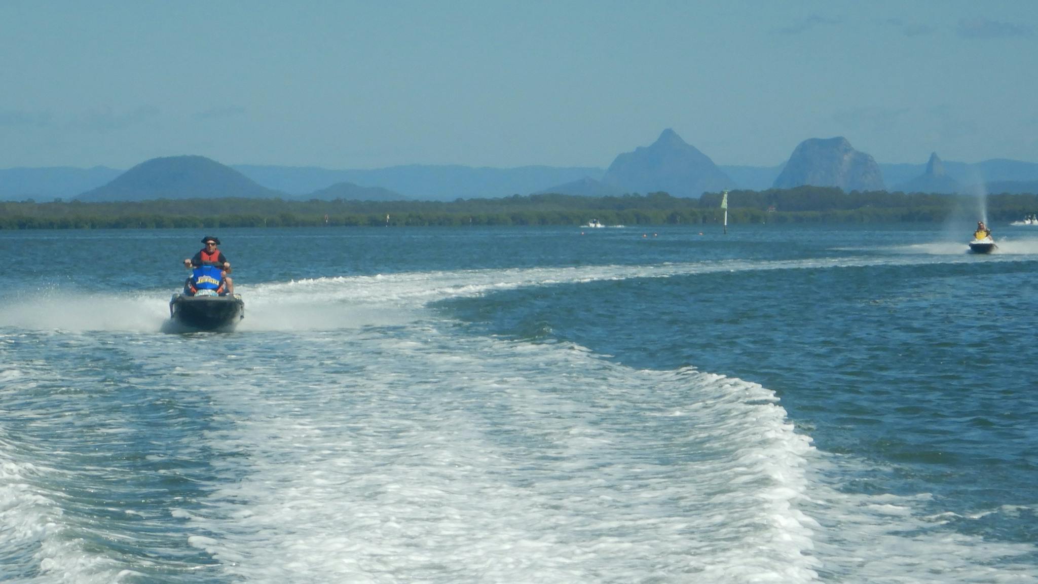 Dominating Pumicestone Passage are the volcanic Glasshouse Mountains