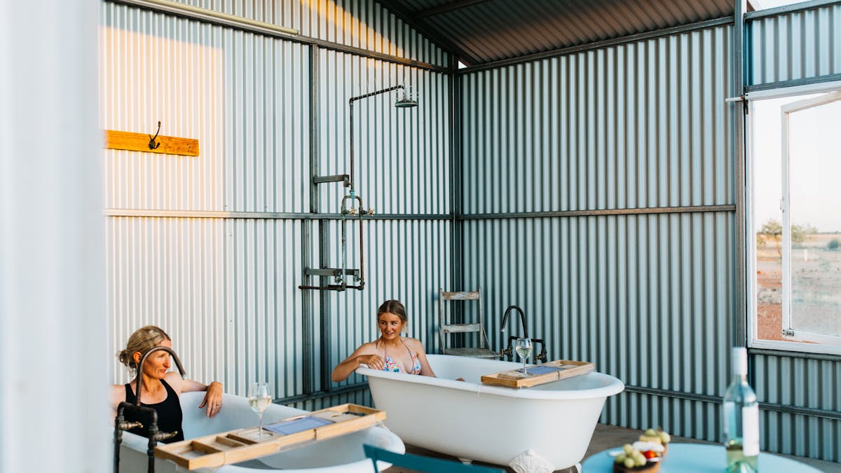 Two women relaxing in bath house