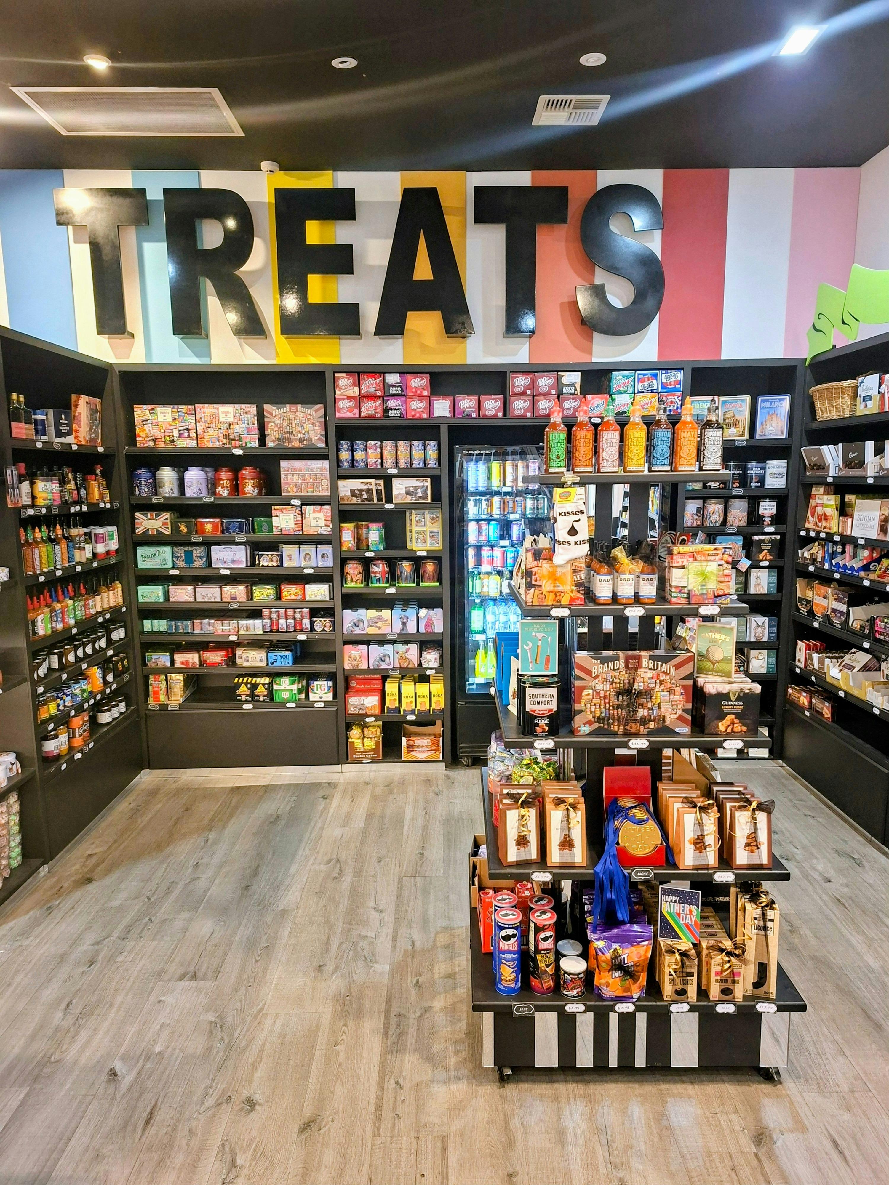 Treats sign, European chocolates and English grocery items