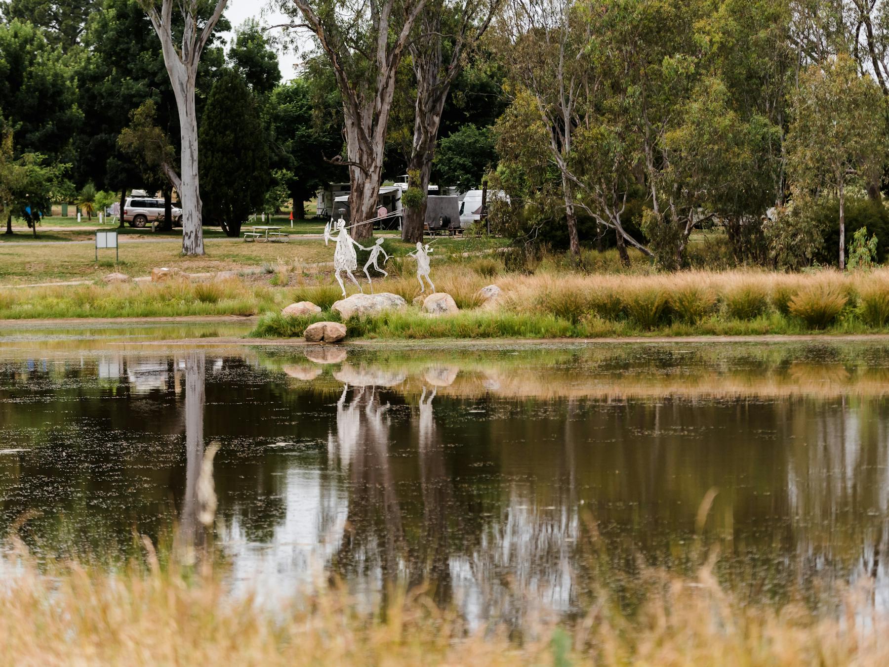 The caravan park overlooks the sculpture and lake