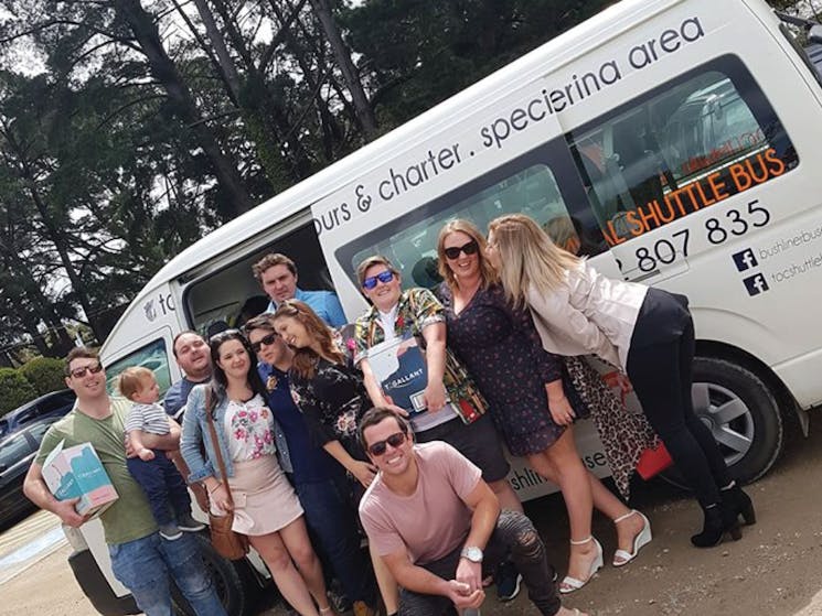 A group of friends donig a winery tour to celebrate a 30th birthday